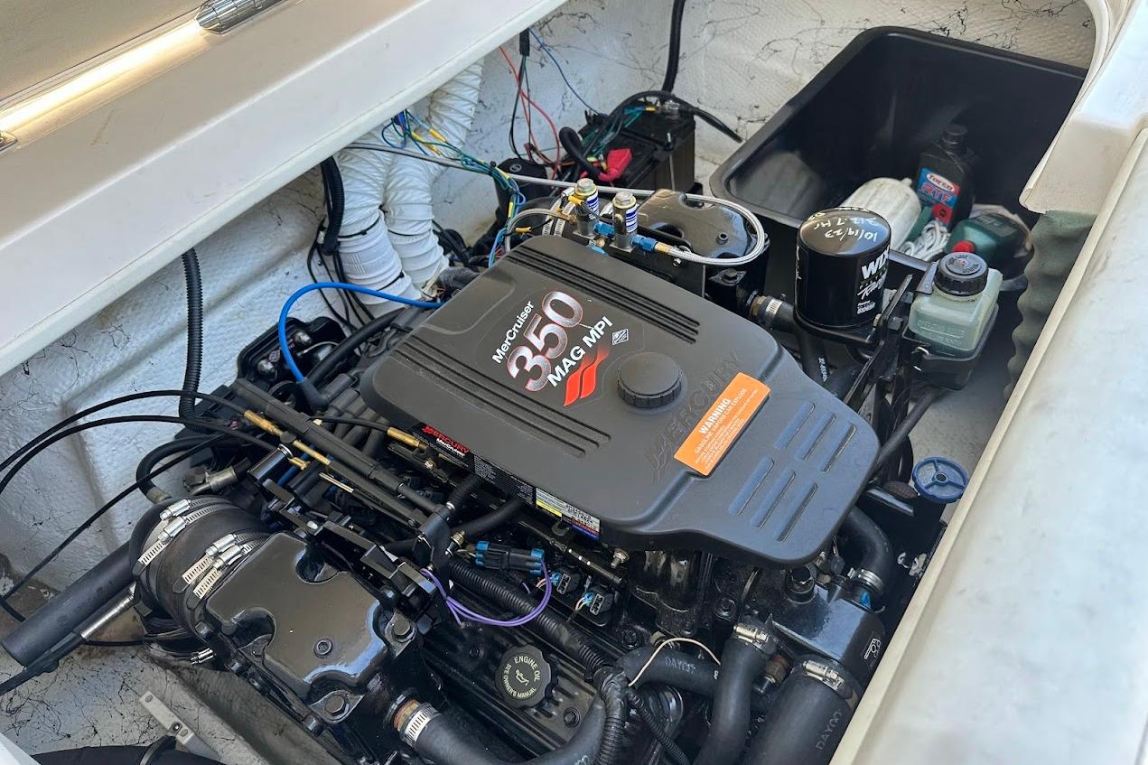 Engine compartment of 2002 Rinker 212 Captiva with MerCruiser 350 MPI engine.