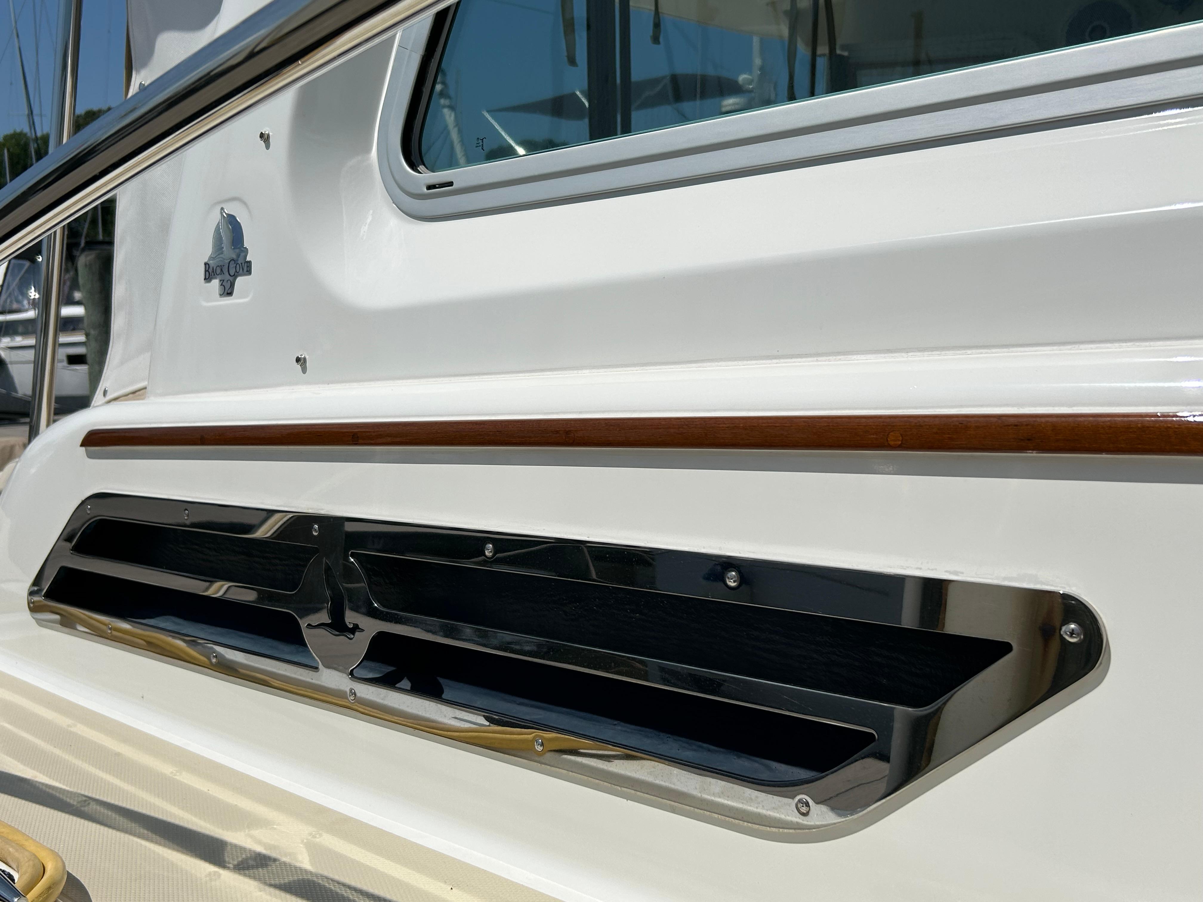 2018 Back Cove 32 boat detail with sleek design and polished metal accents.