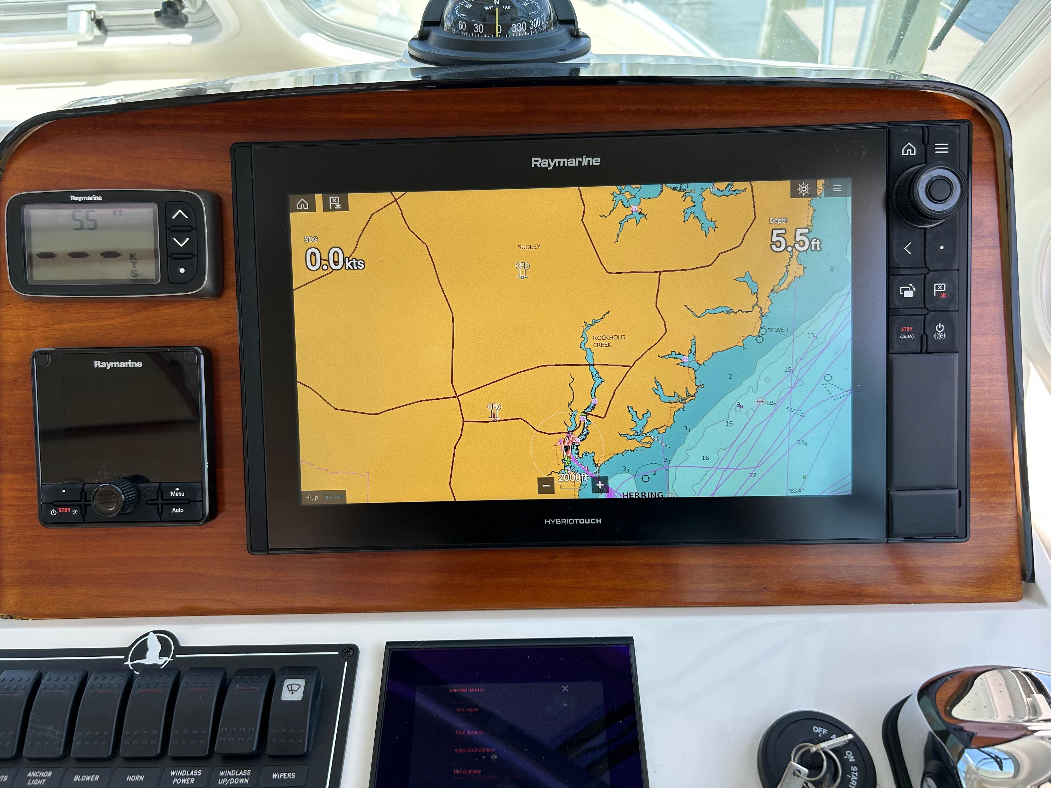Navigation system on 2018 Back Cove 32 boat, featuring Raymarine display and controls.