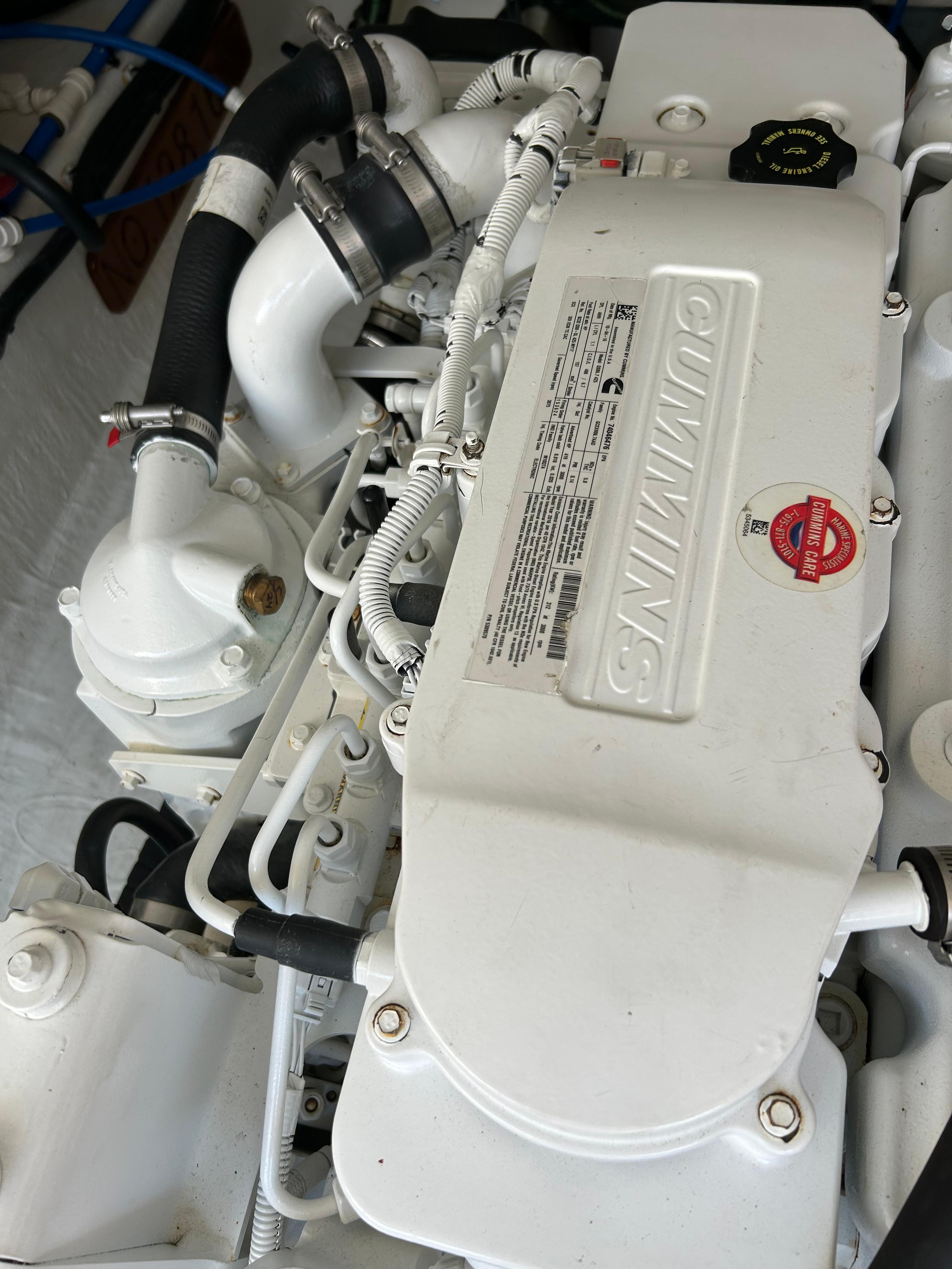 Engine compartment of a 2018 Back Cove 32 boat featuring a Cummins engine.