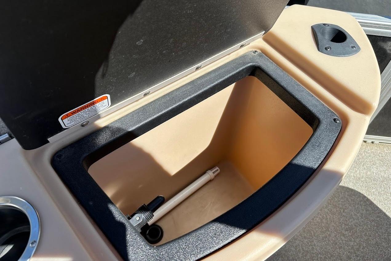 Open storage compartment on 2019 Sun Tracker Bass Buggy 18 DLX boat.