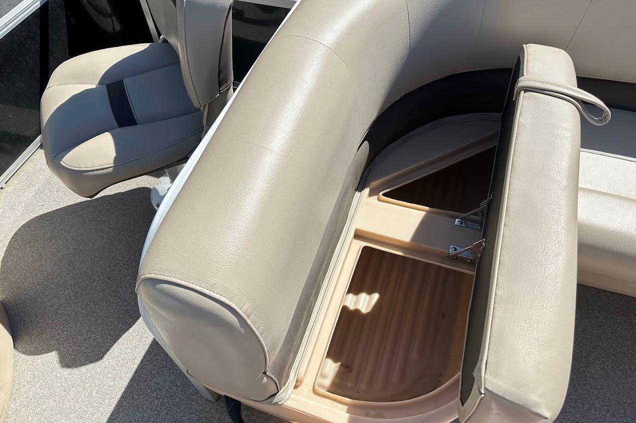 2019 Sun Tracker Bass Buggy 18 DLX boat interior with open storage compartment.