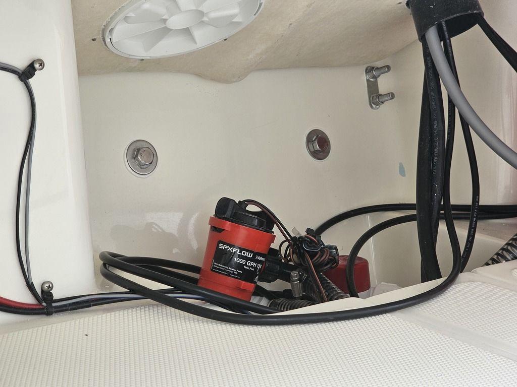 2025 Mako Pro Skiff 15 CC bilge area with wiring and pump.