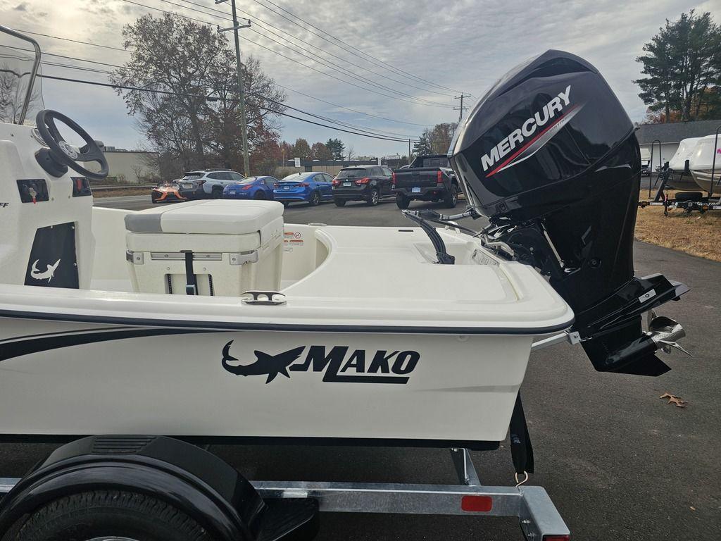 2025 Mako Pro Skiff 15 CC with Mercury outboard motor on trailer.