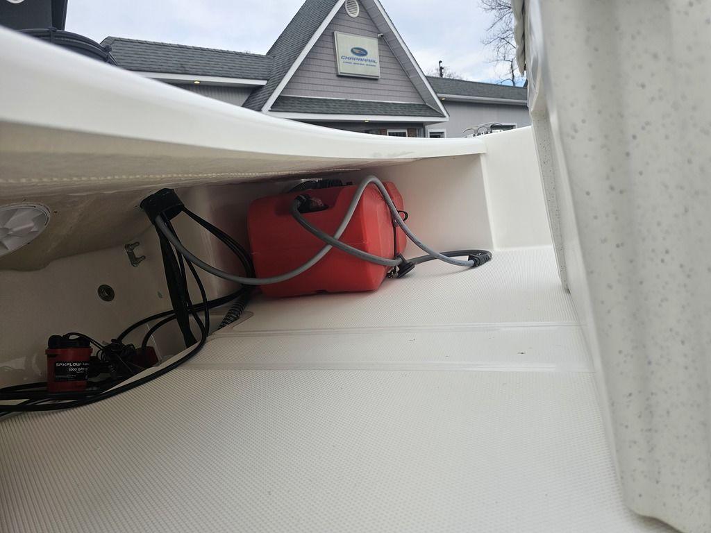 2025 Mako Pro Skiff 15 CC interior with red fuel tank and wiring.