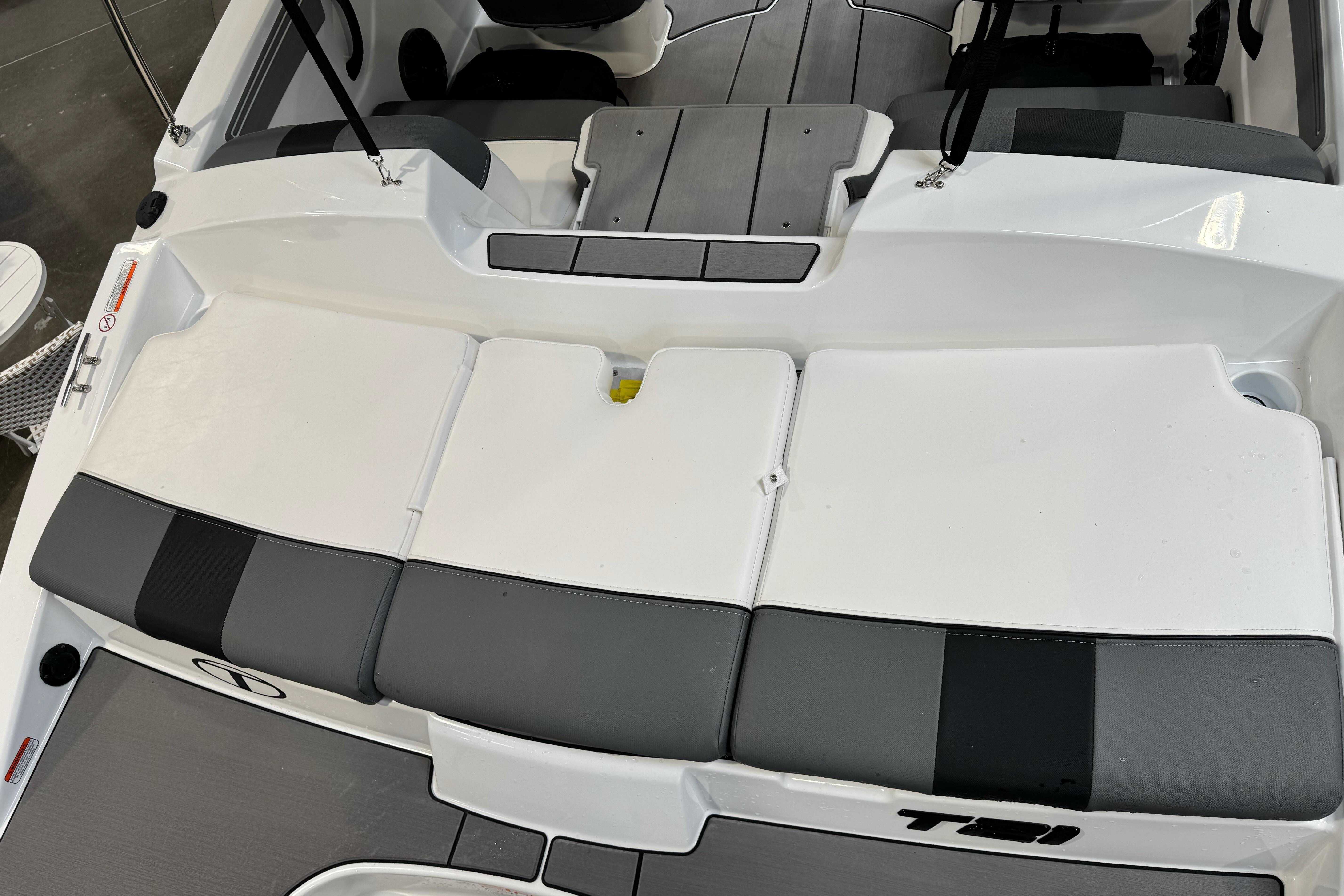 2026 Tahoe T21 boat interior with gray and white seating, sleek design.