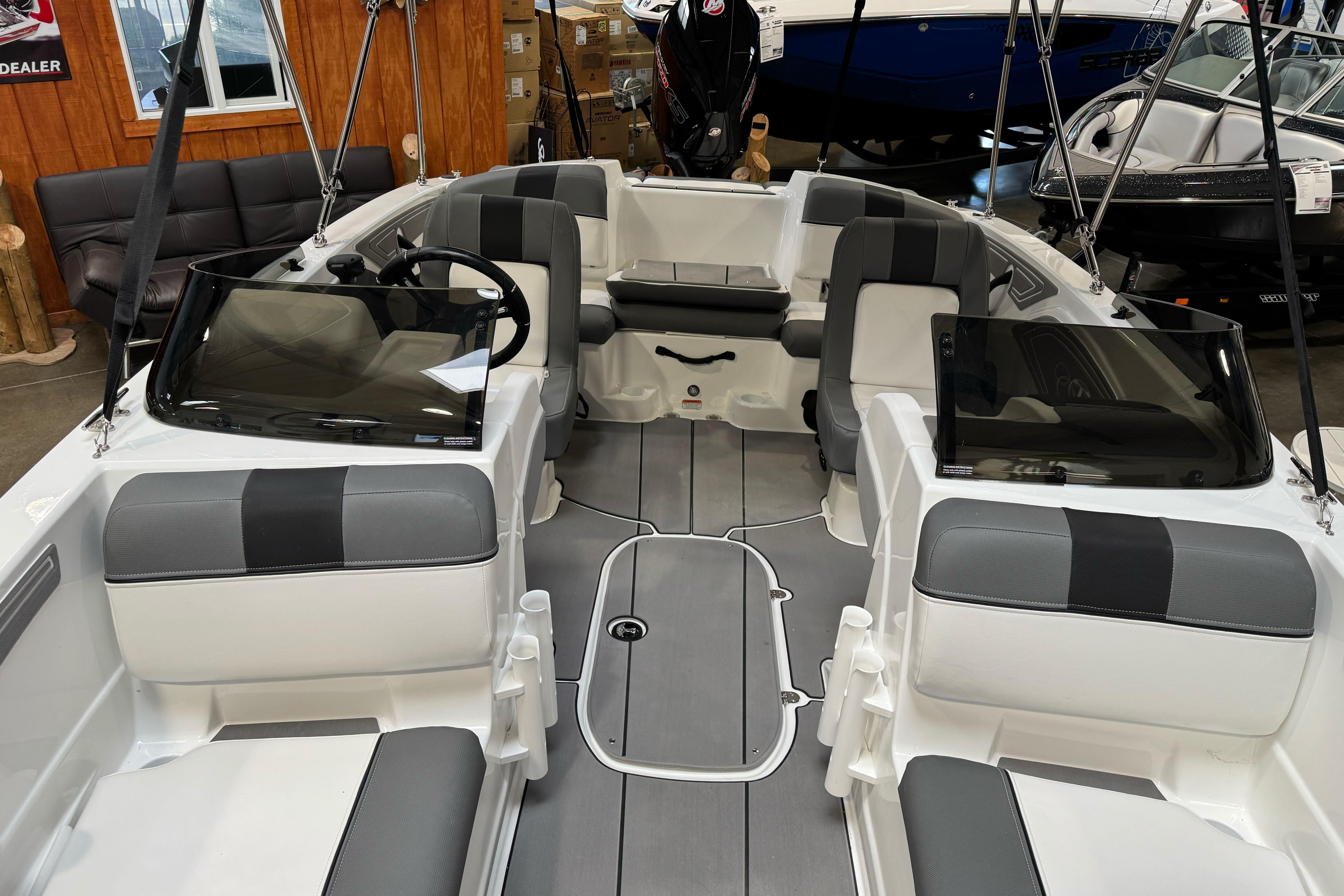 Interior of 2026 Tahoe T21 boat with gray seating and modern design.