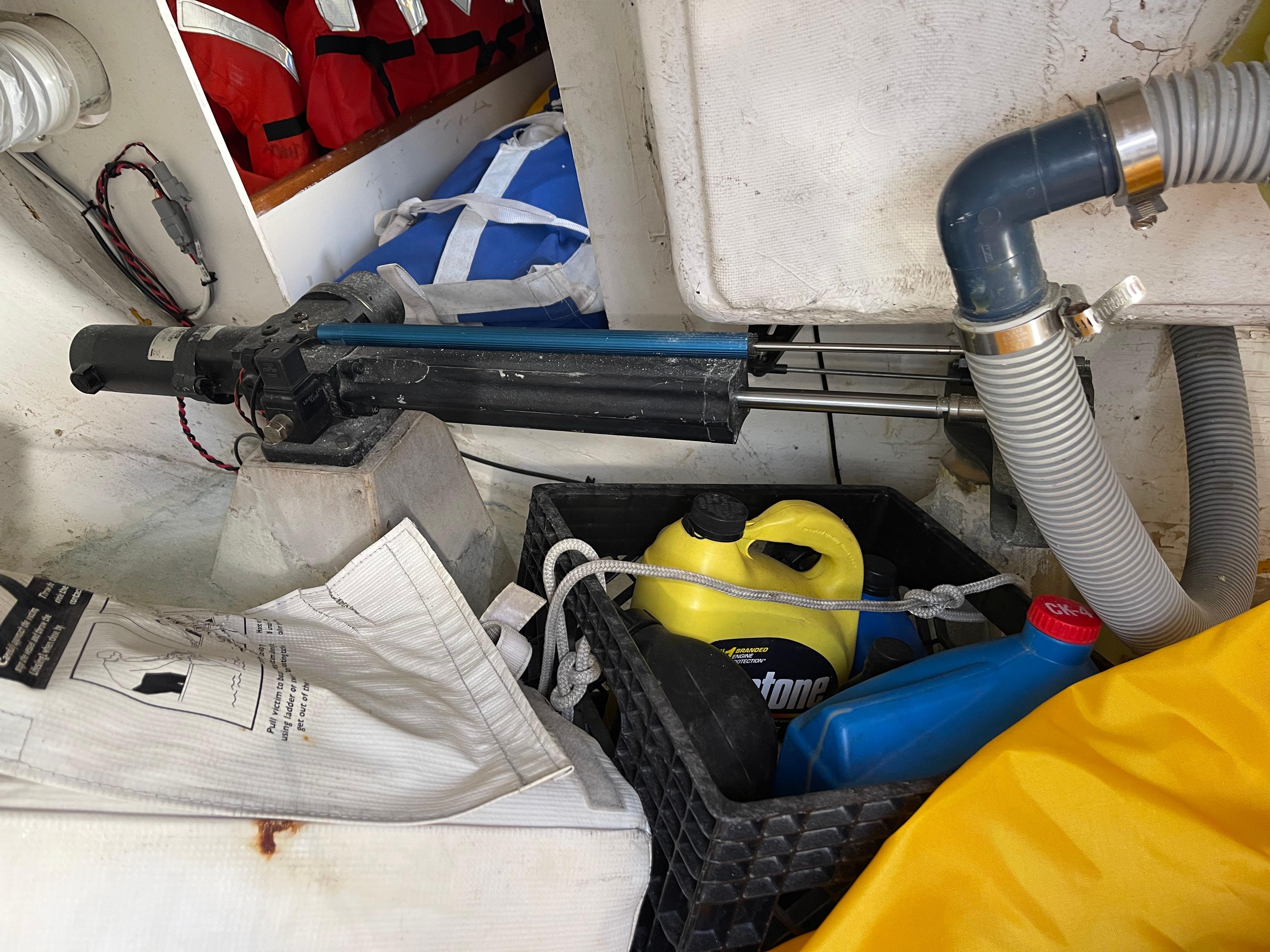 Storage area on a 1964 CAL 40 sailboat with equipment and supplies.