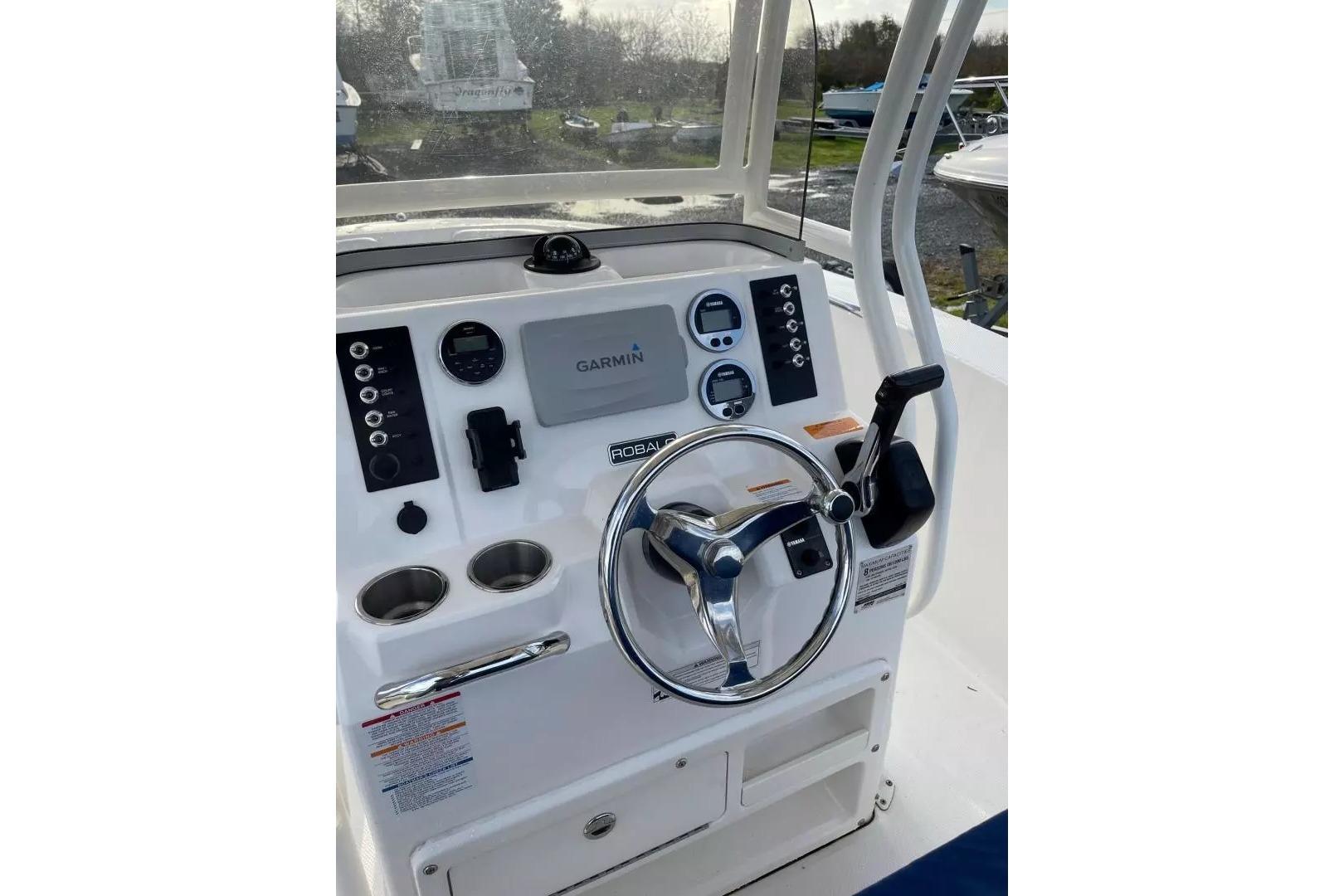2016 Robalo R200 Center Console dashboard with Garmin navigation system and steering wheel.