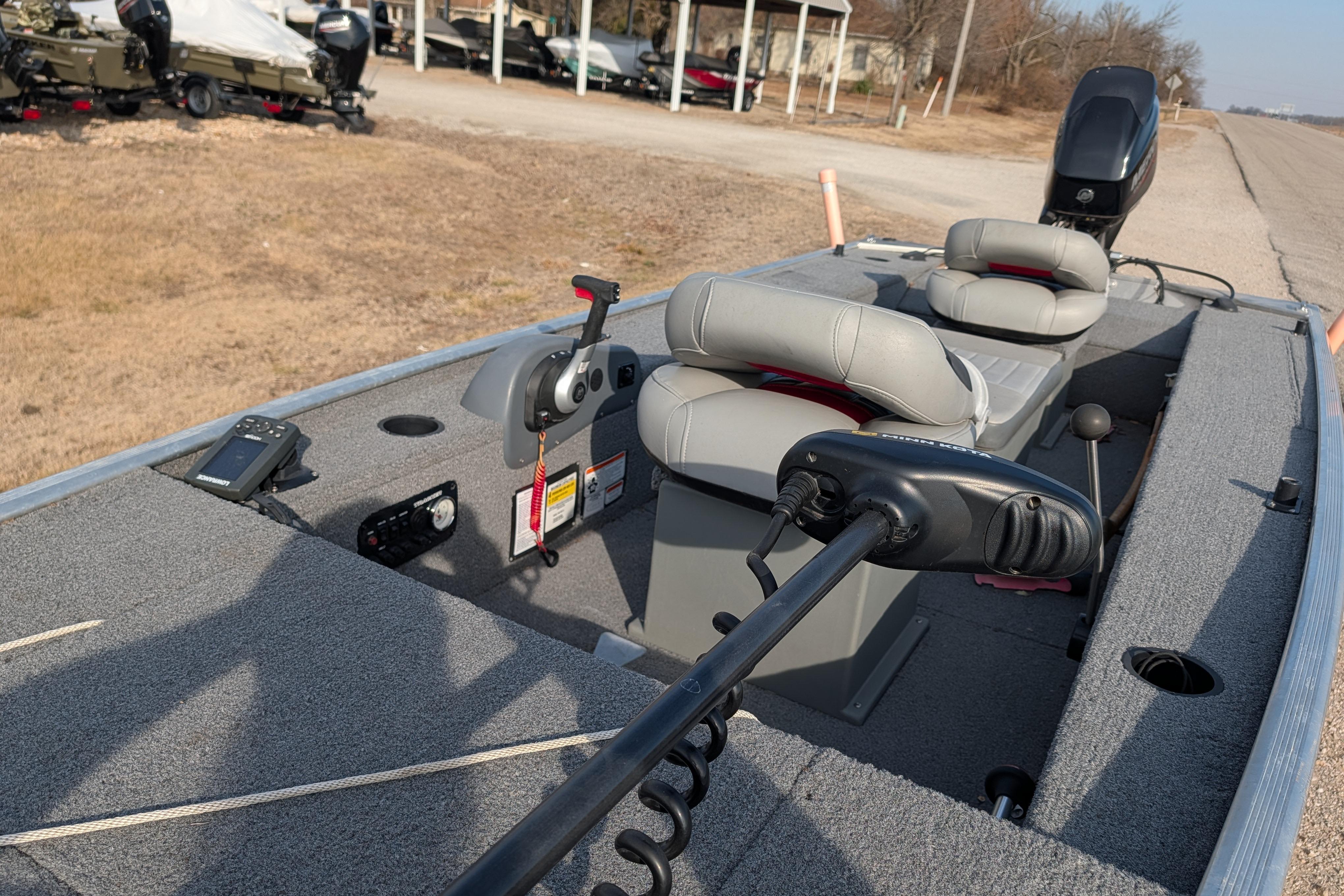 2017 Tracker Panfish 16 boat interior with seats and control panel.