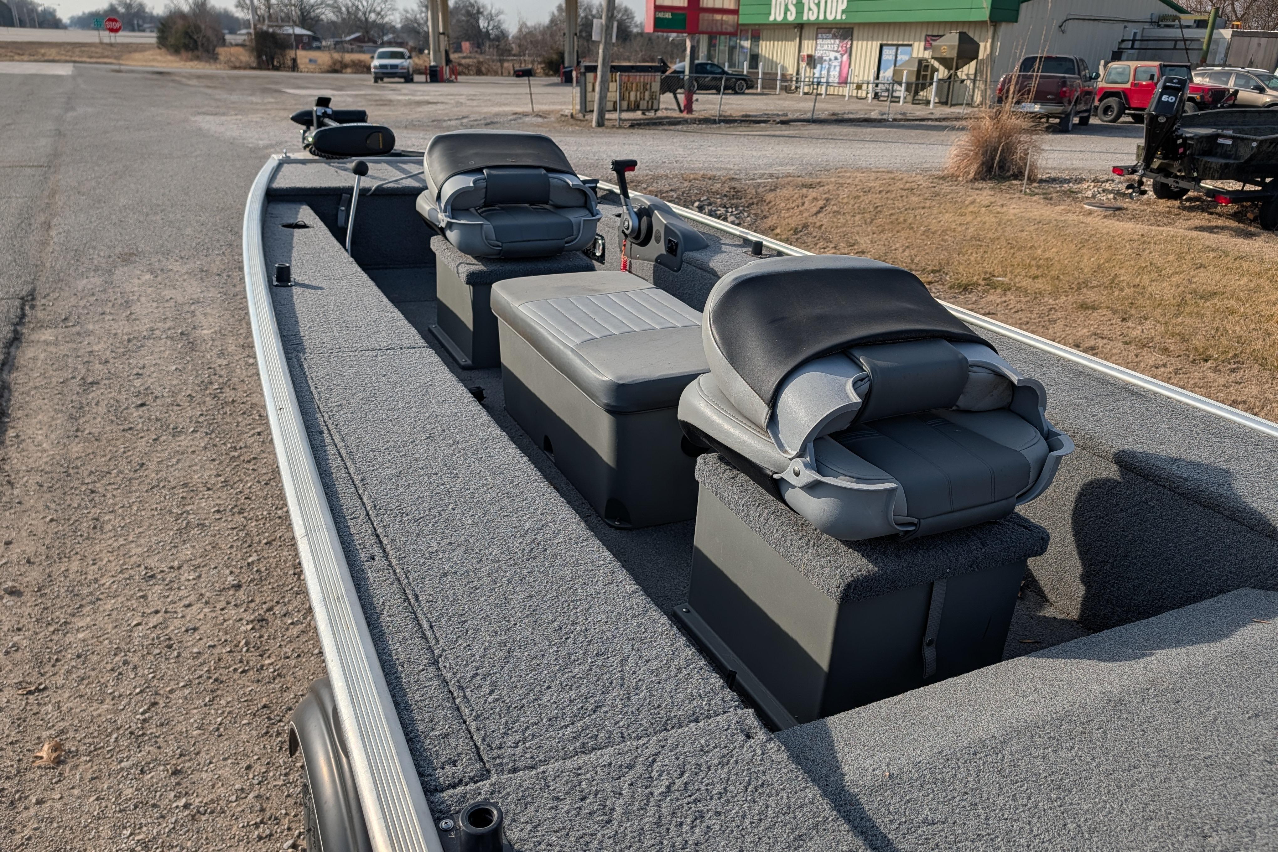 2017 Tracker Panfish 16 boat with gray seating and carpeted interior.