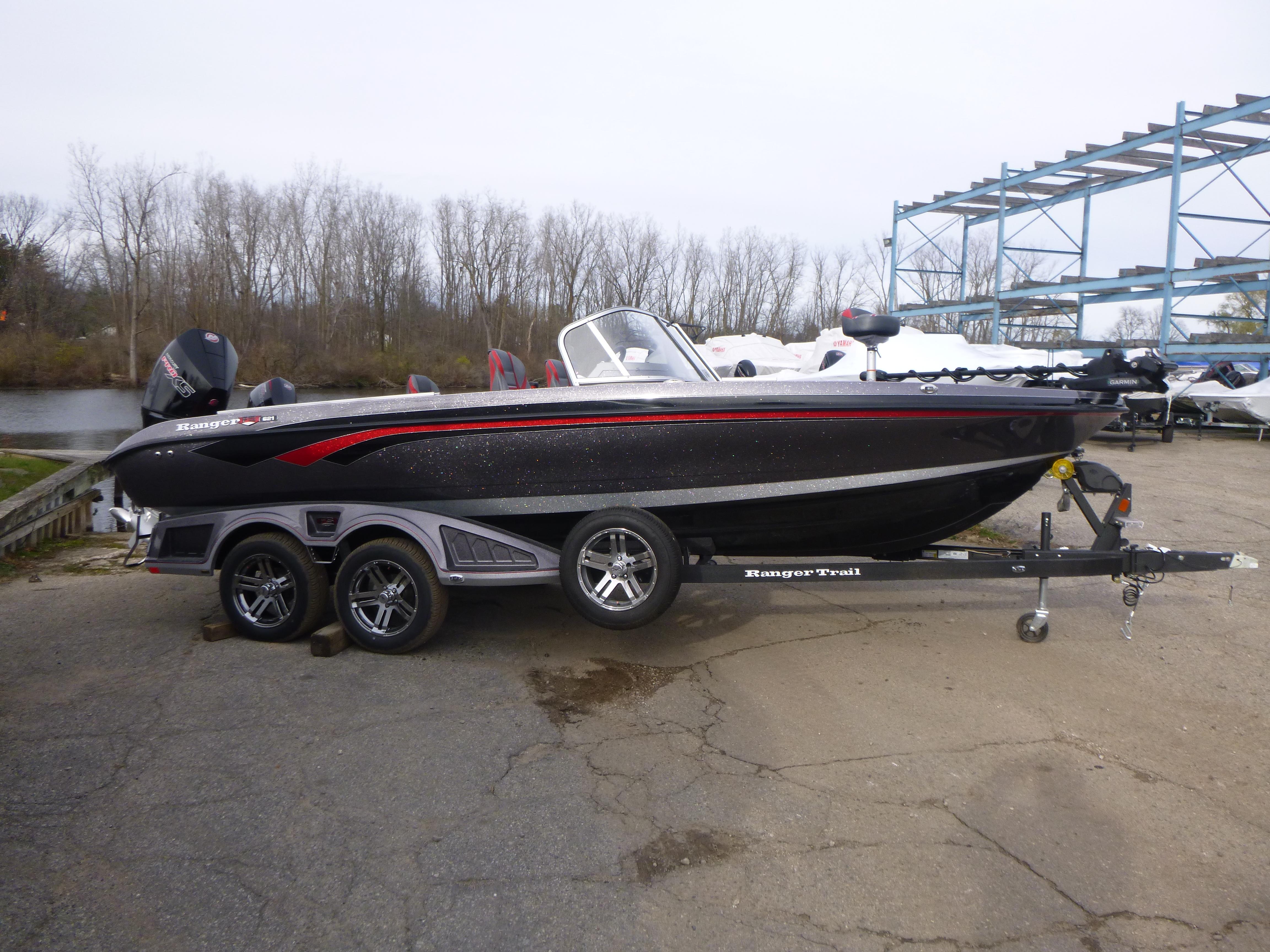 2025 Ranger 621FS Ranger Cup Equipped boat on trailer, parked outdoors.