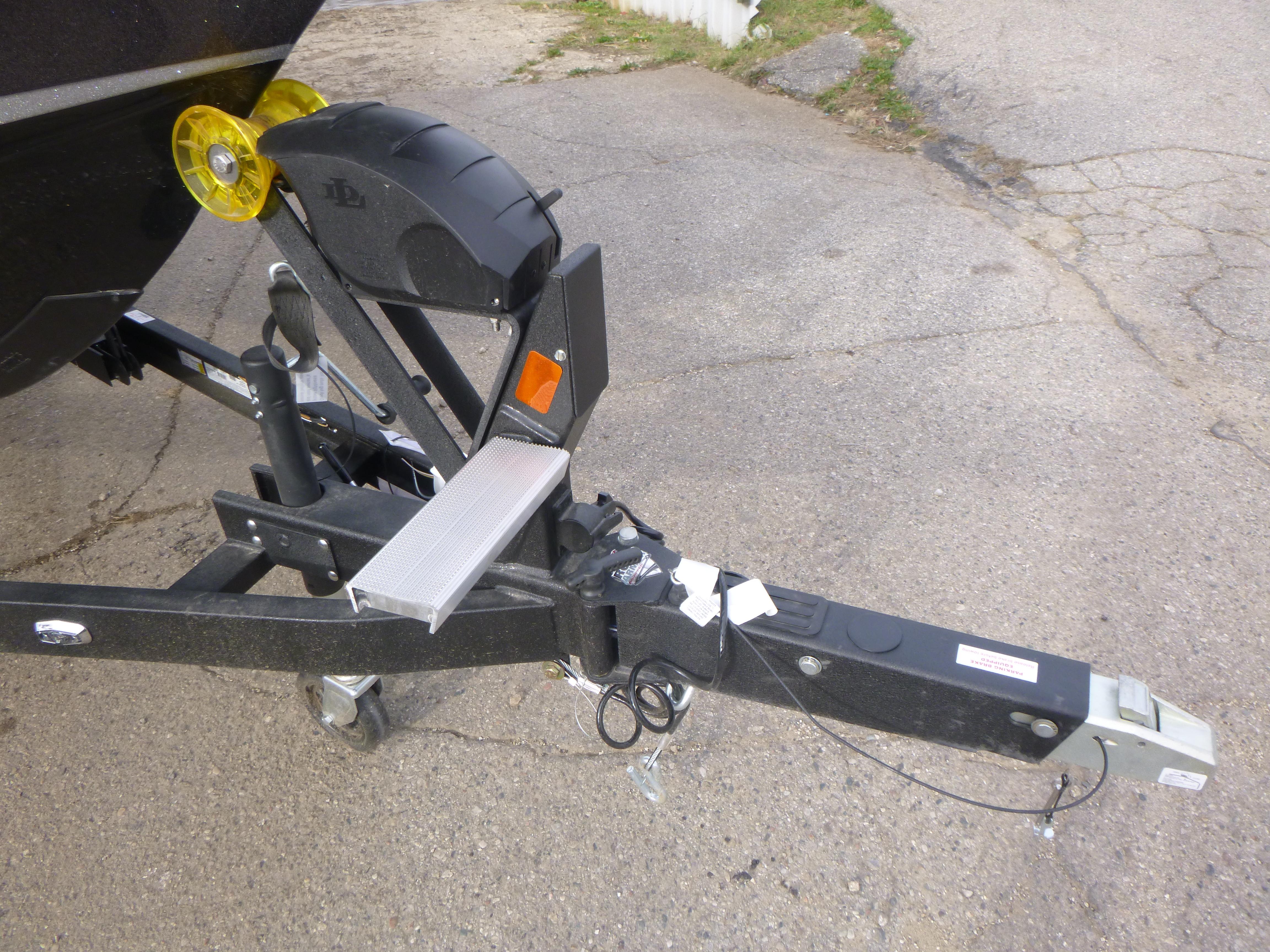 Trailer hitch of 2025 Ranger 621FS Ranger Cup Equipped boat on pavement.