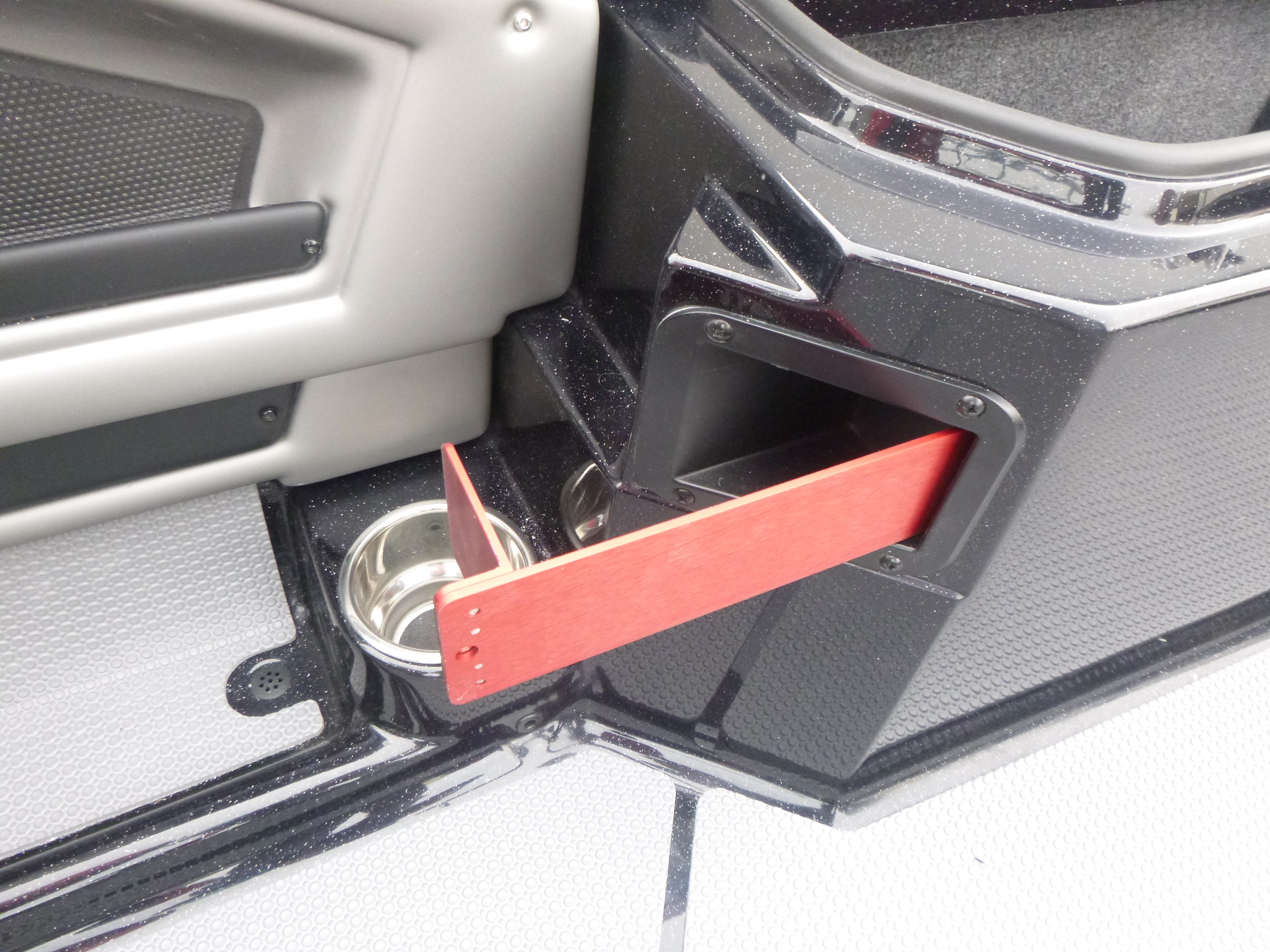 2025 Ranger 621FS Ranger Cup Equipped interior detail with cup holder and storage compartment.