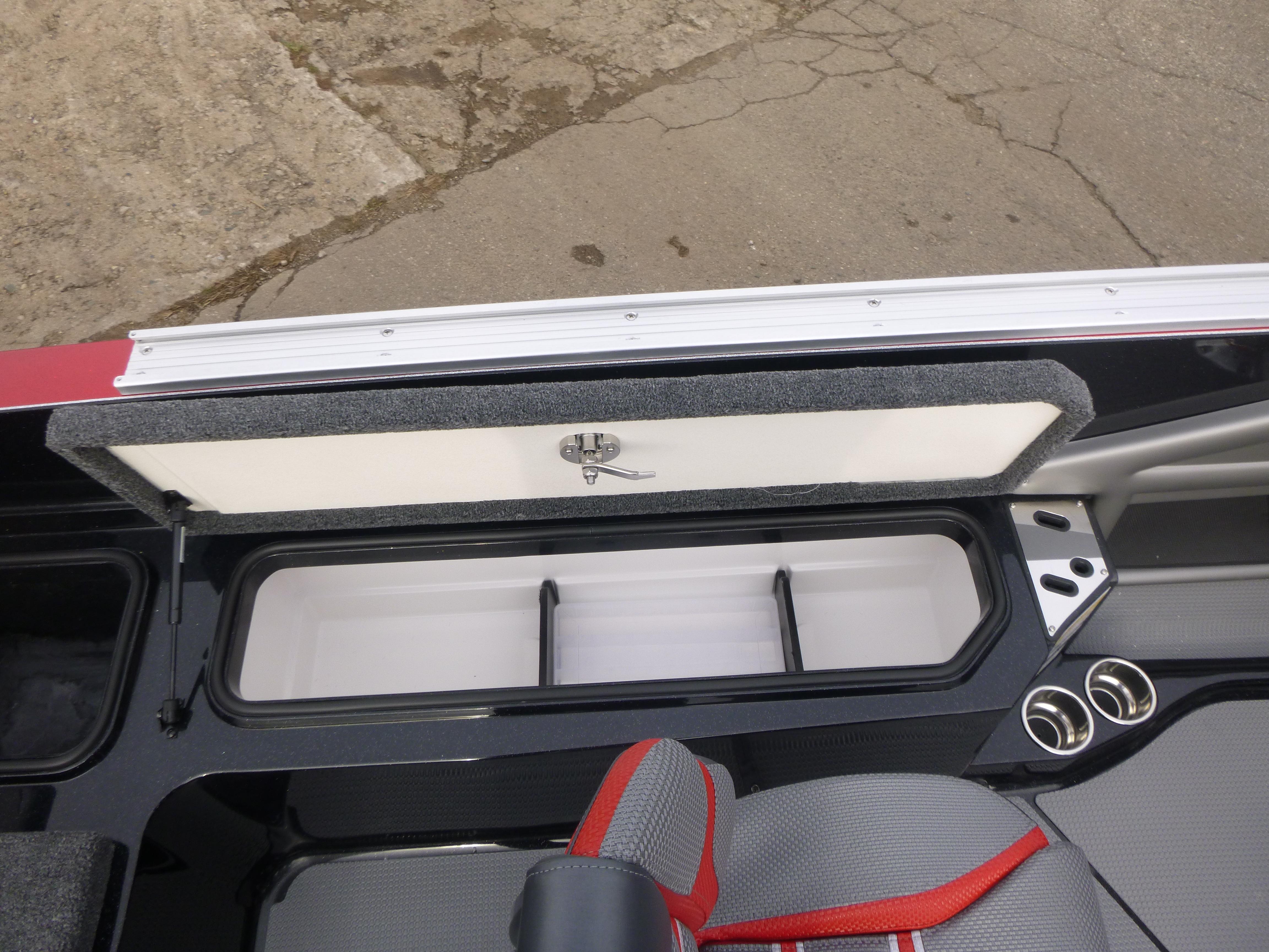 2025 Ranger 621FS Ranger Cup Equipped boat interior with storage compartment and seating.