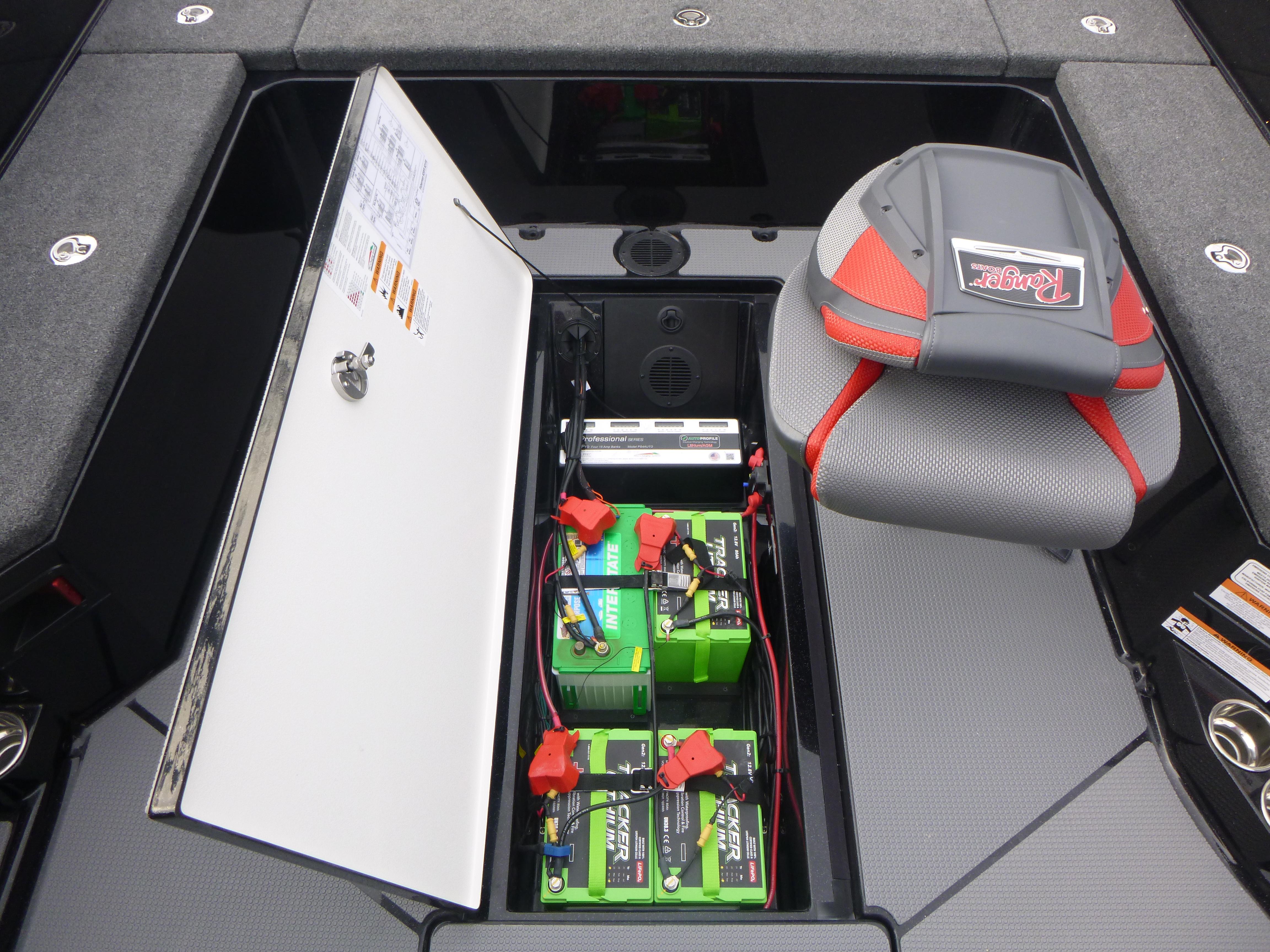 2025 Ranger 621FS Ranger Cup Equipped boat battery compartment with storage and seat.