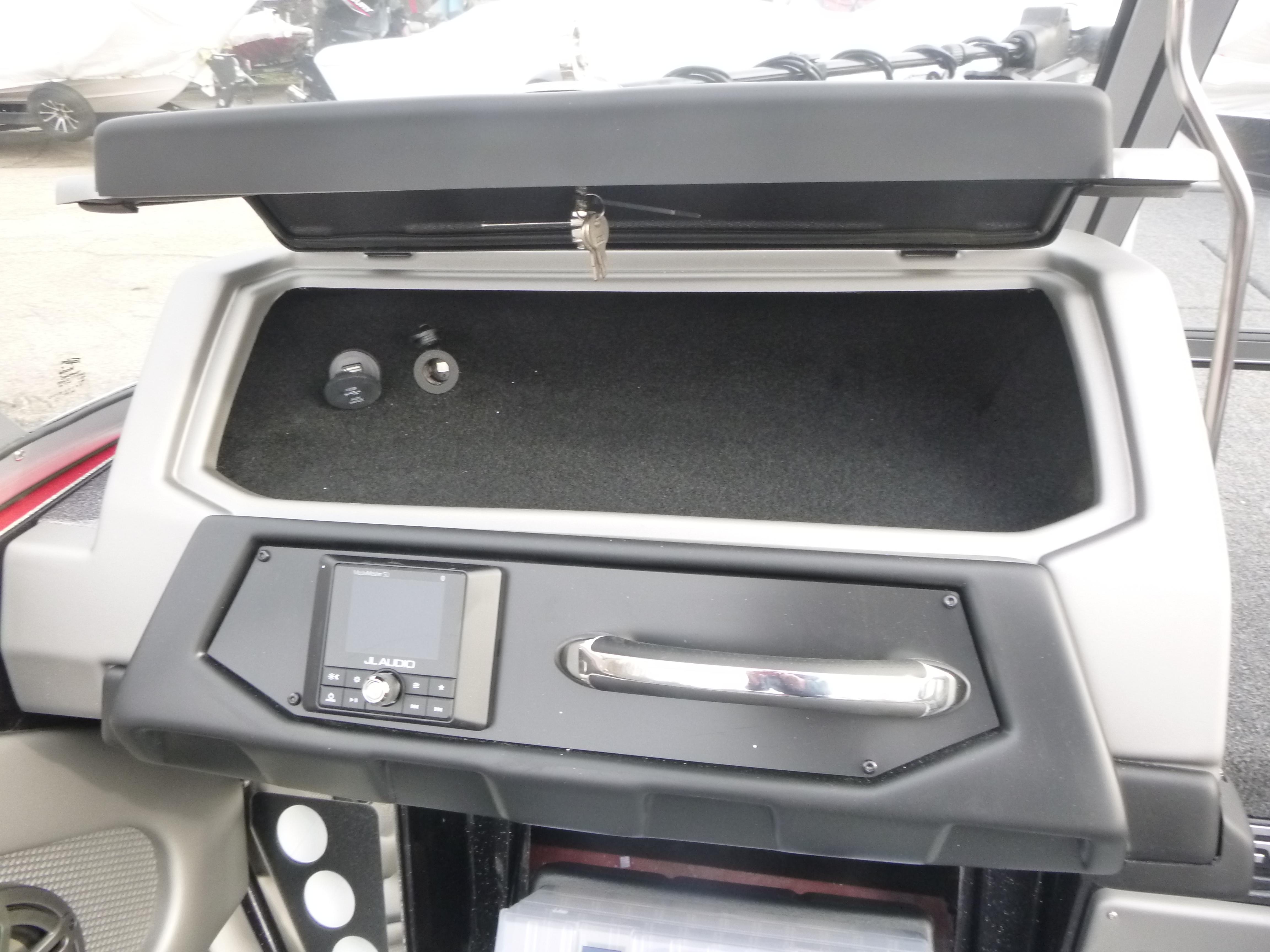 2025 Ranger 621FS Ranger Cup Equipped dashboard with storage compartment and control panel.
