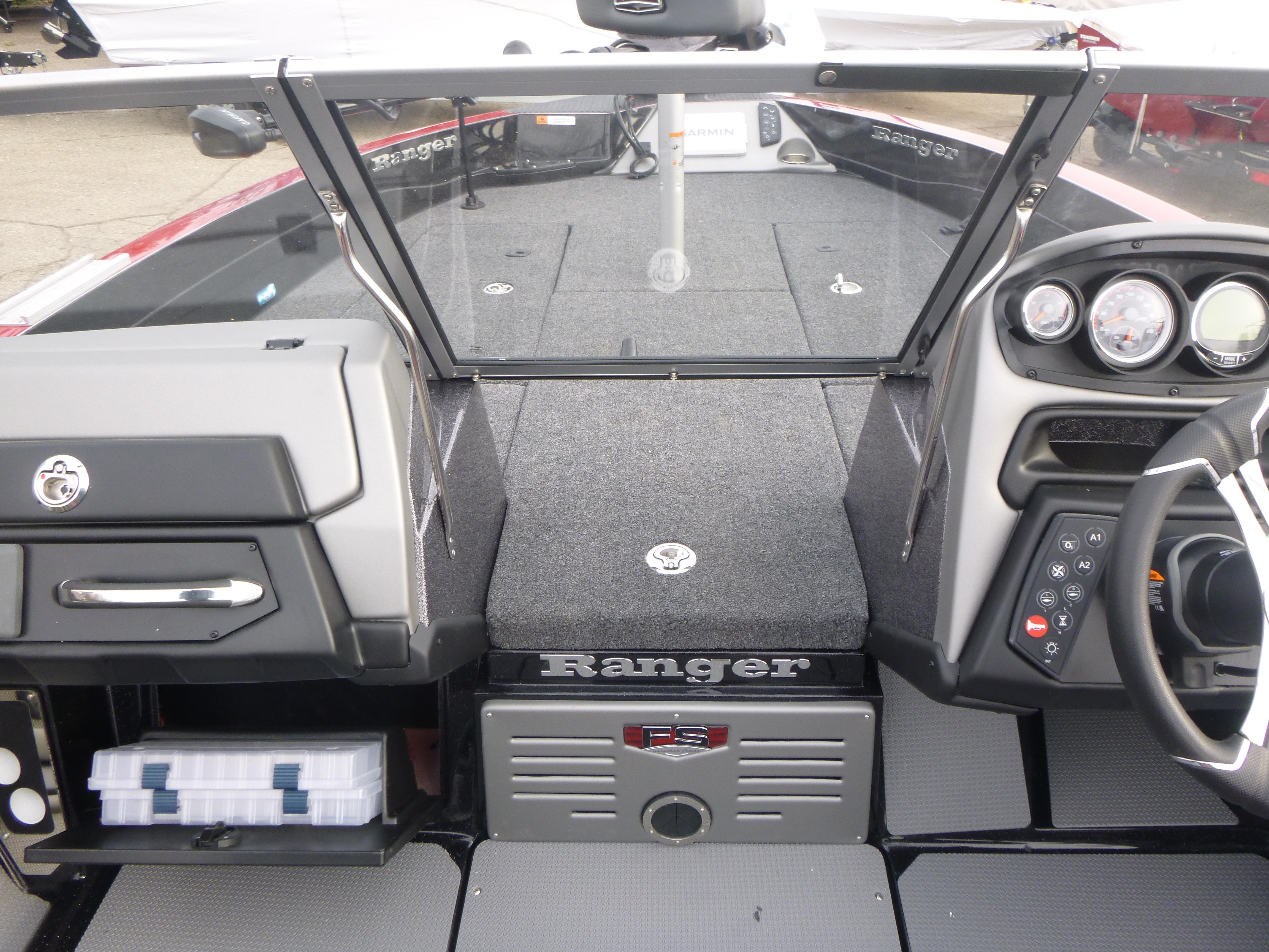 2025 Ranger 621FS Ranger Cup Equipped boat interior with dashboard and storage compartments.