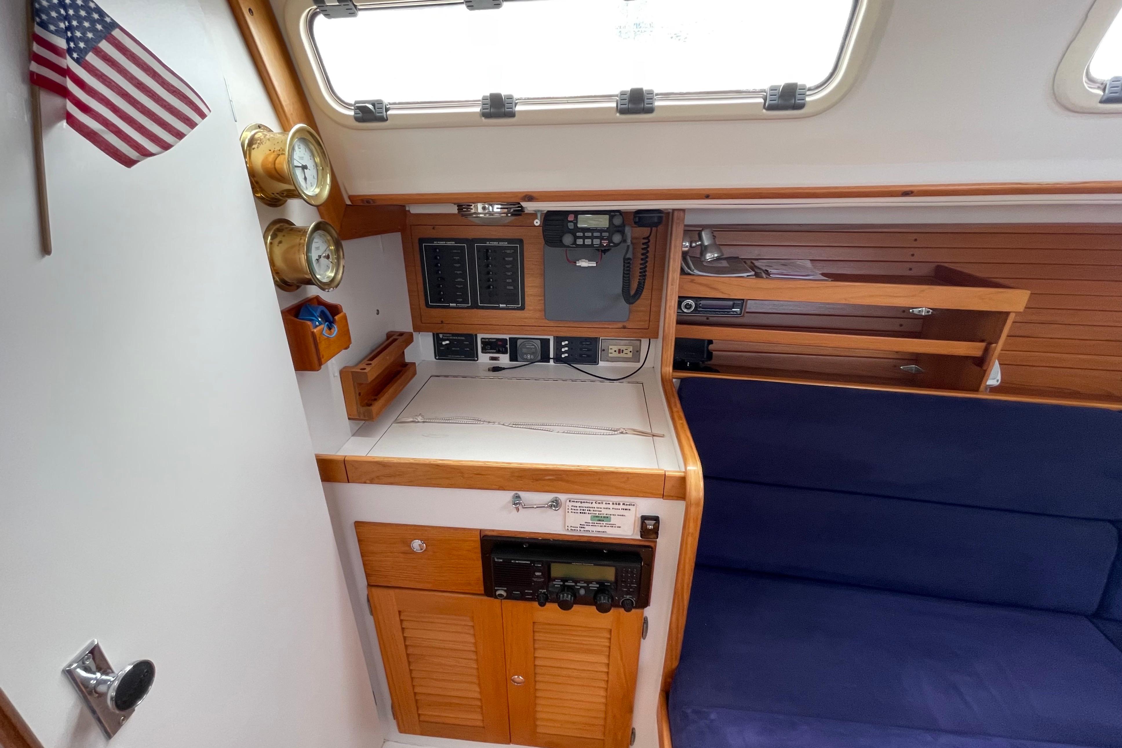2001 J Boats J/32 interior with navigation station, instruments, and seating area.