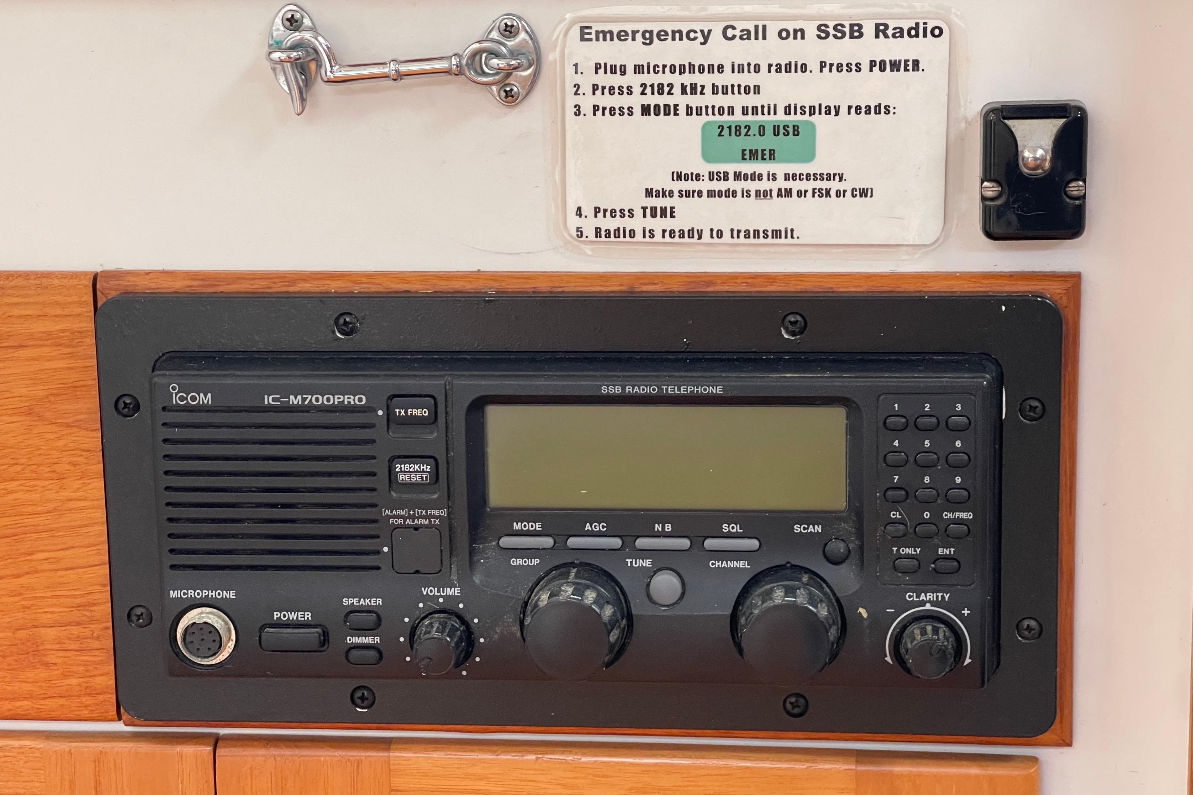 ICOM IC-M700PRO SSB radio on 2001 J Boats J/32, with emergency call instructions.