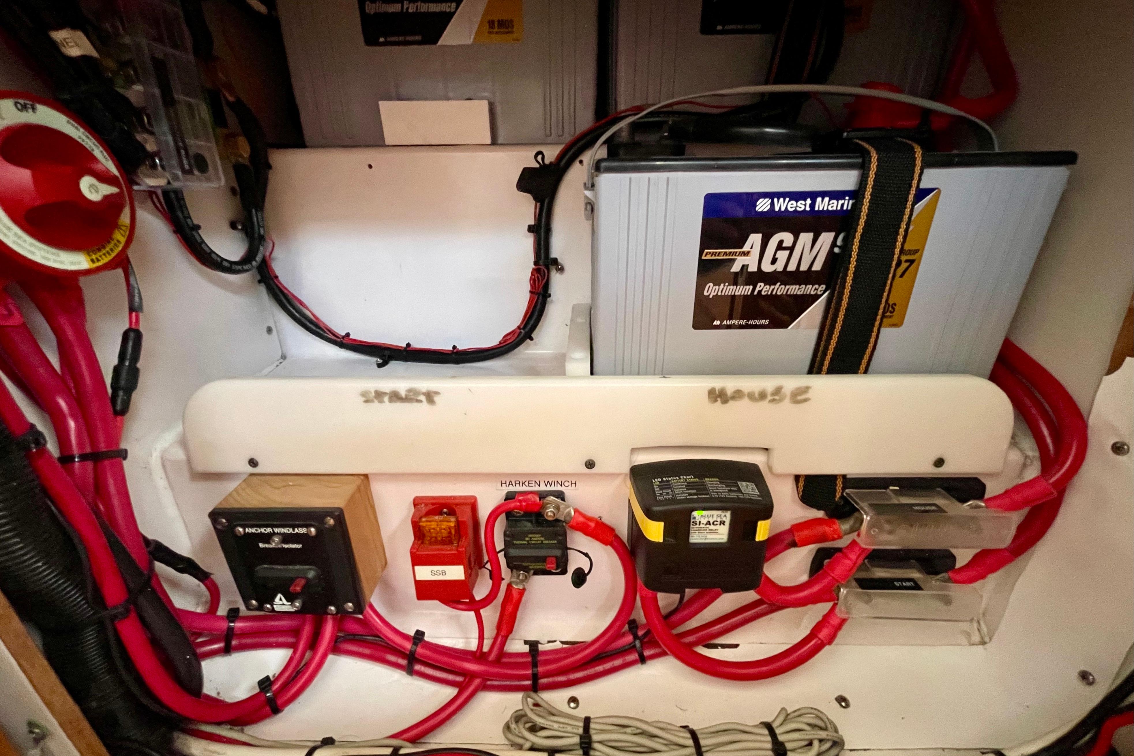 Electrical system of a 2001 J Boats J/32, featuring AGM battery and wiring.