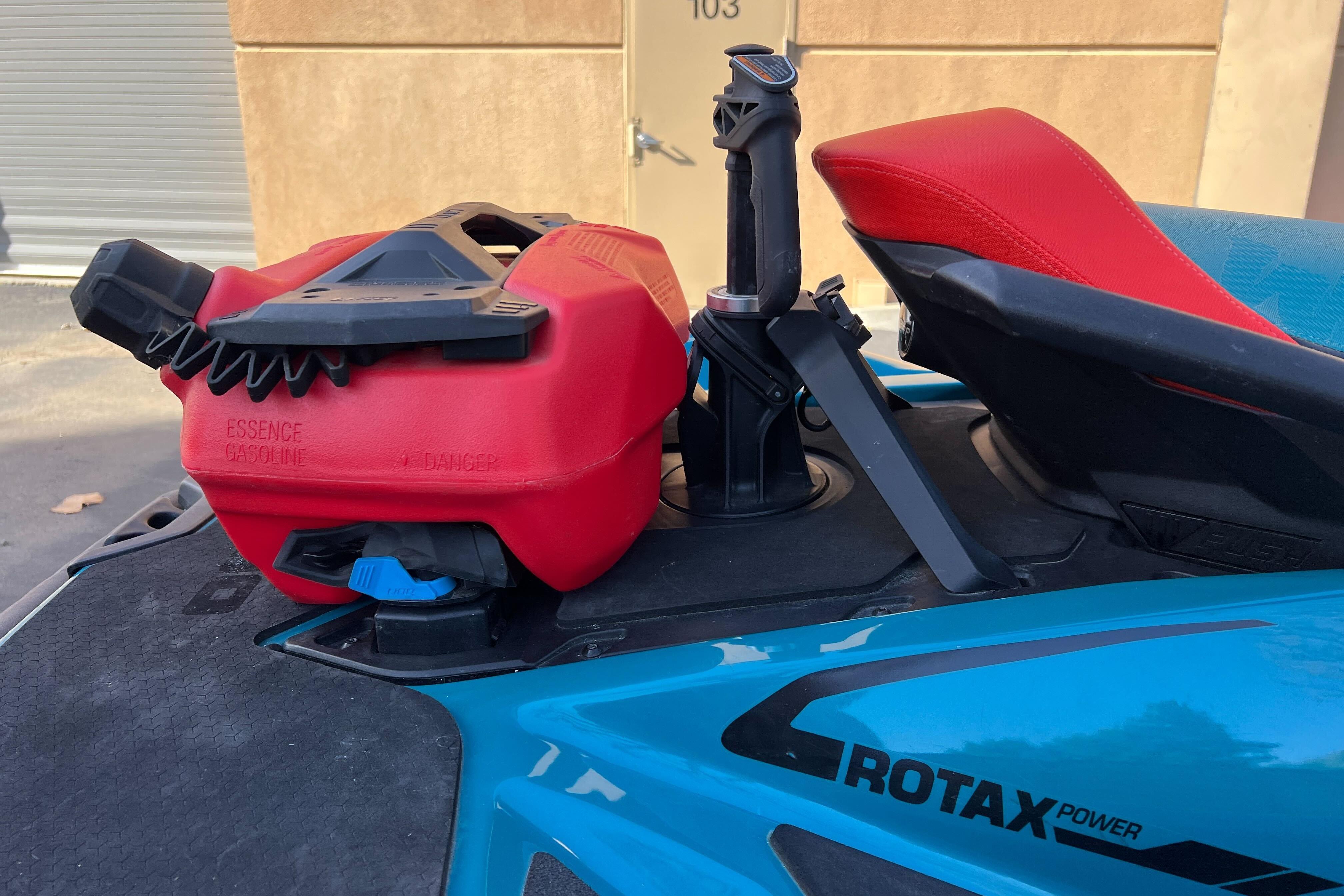 2018 Sea-Doo Wake Pro 230 with red fuel canister and Rotax power branding.