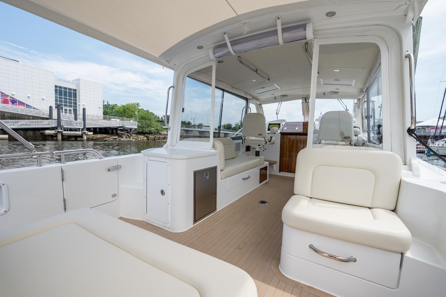 Luxurious 2025 MJM 35 yacht interior with comfortable seating and modern design.
