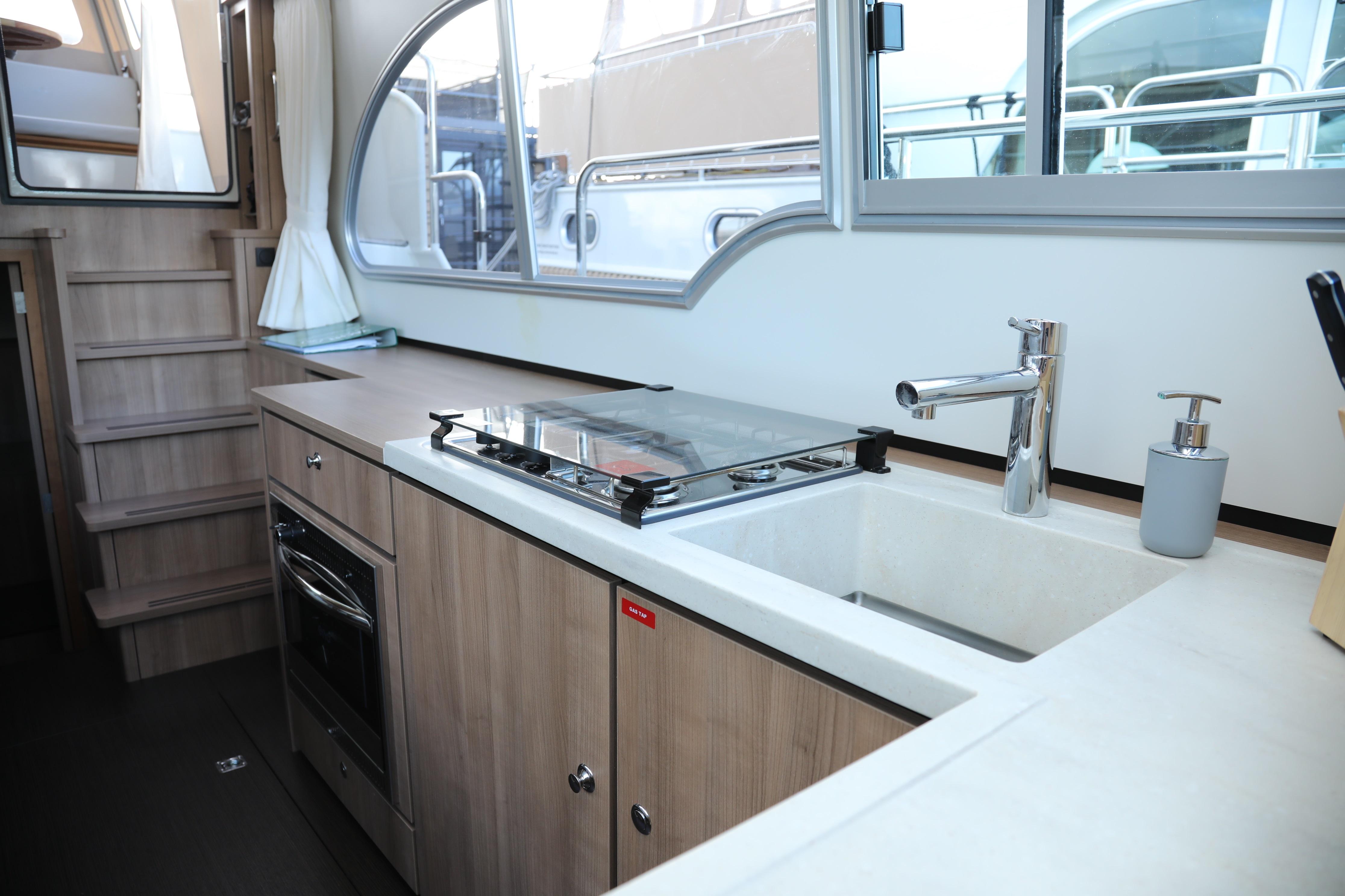 Modern kitchen interior of 2022 Linssen Grand Sturdy 35.0 AC INTERO yacht.