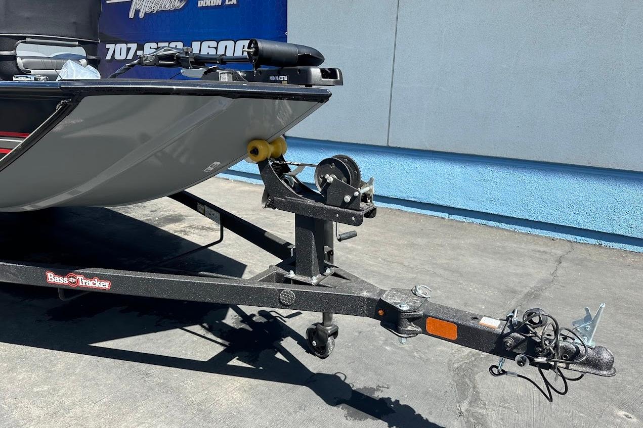 2026 Tracker Bass Tracker Classic XL boat on trailer, parked outdoors.