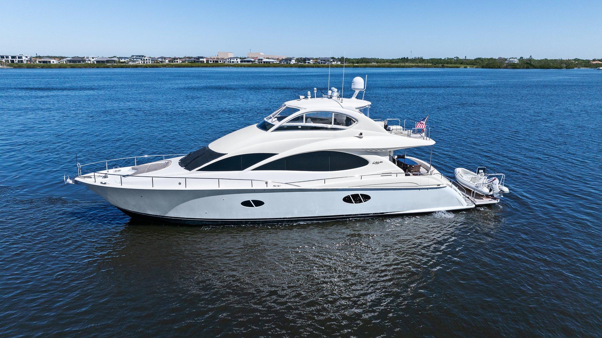 Lazzara-68 Pilothouse Motoryacht 2005 -FL-US-2005 Lazzara 68 Pilothouse Motoryacht cruising on a calm blue waterway.-9729104 | Thumbnail