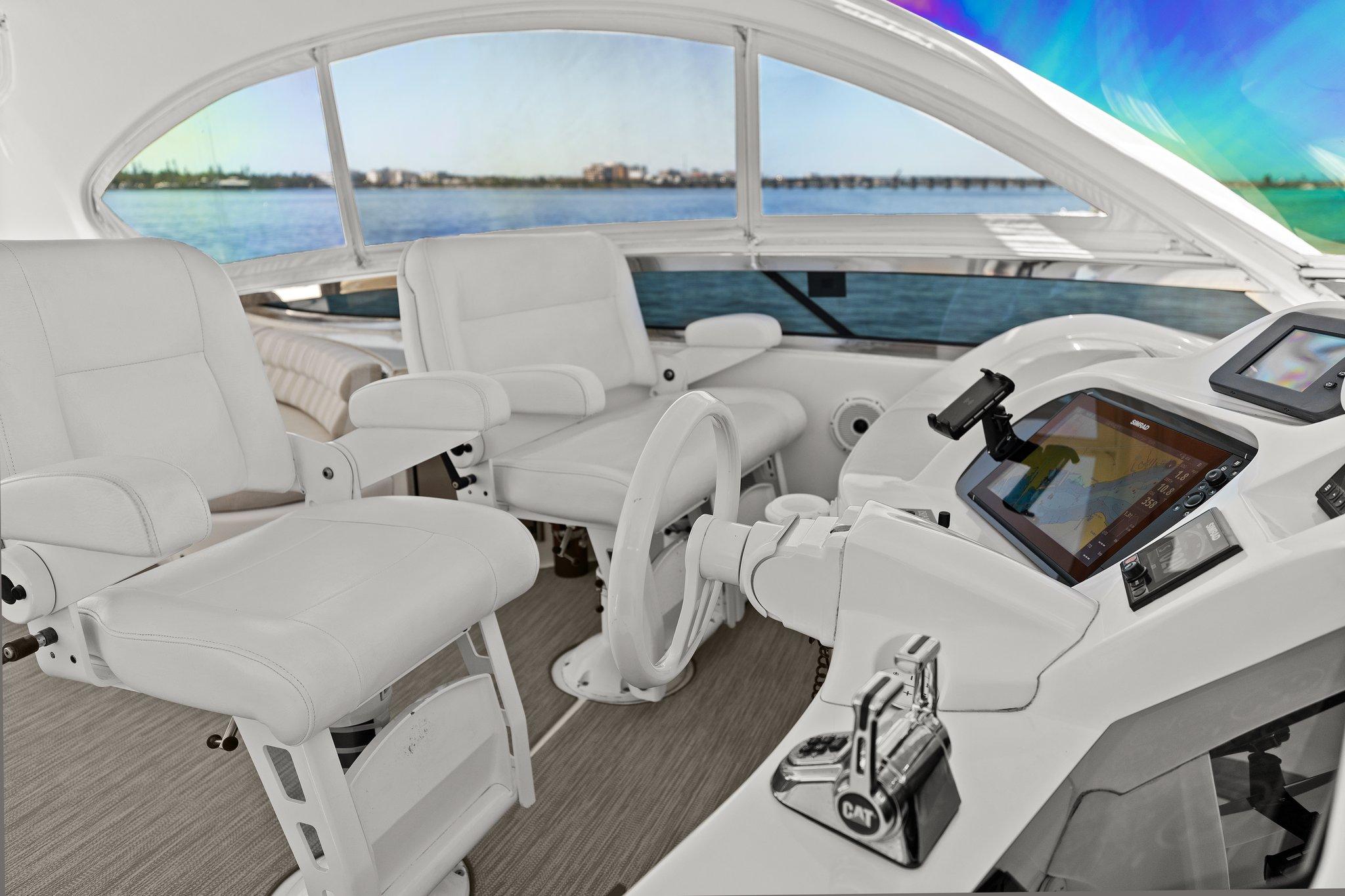 Lazzara-68 Pilothouse Motoryacht 2005 -FL-US-Pilothouse interior of 2005 Lazzara 68 Motoryacht with modern controls and white seating.-9729104 | Thumbnail
