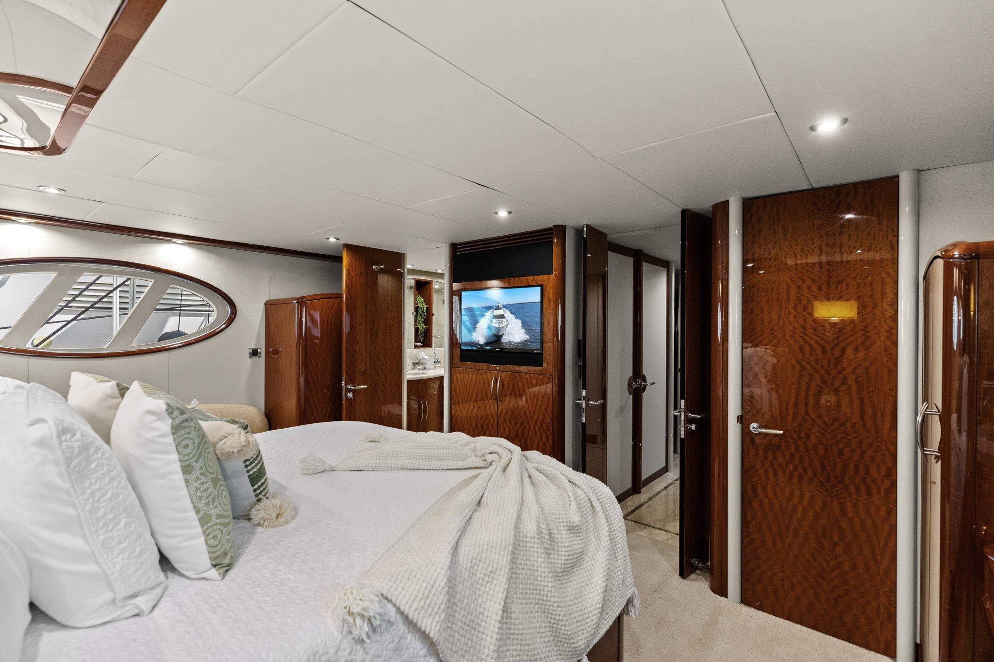 Lazzara-68 Pilothouse Motoryacht 2005 -FL-US-Luxurious bedroom interior of 2005 Lazzara 68 Pilothouse Motoryacht with elegant wood finishes.-9729104 | Thumbnail