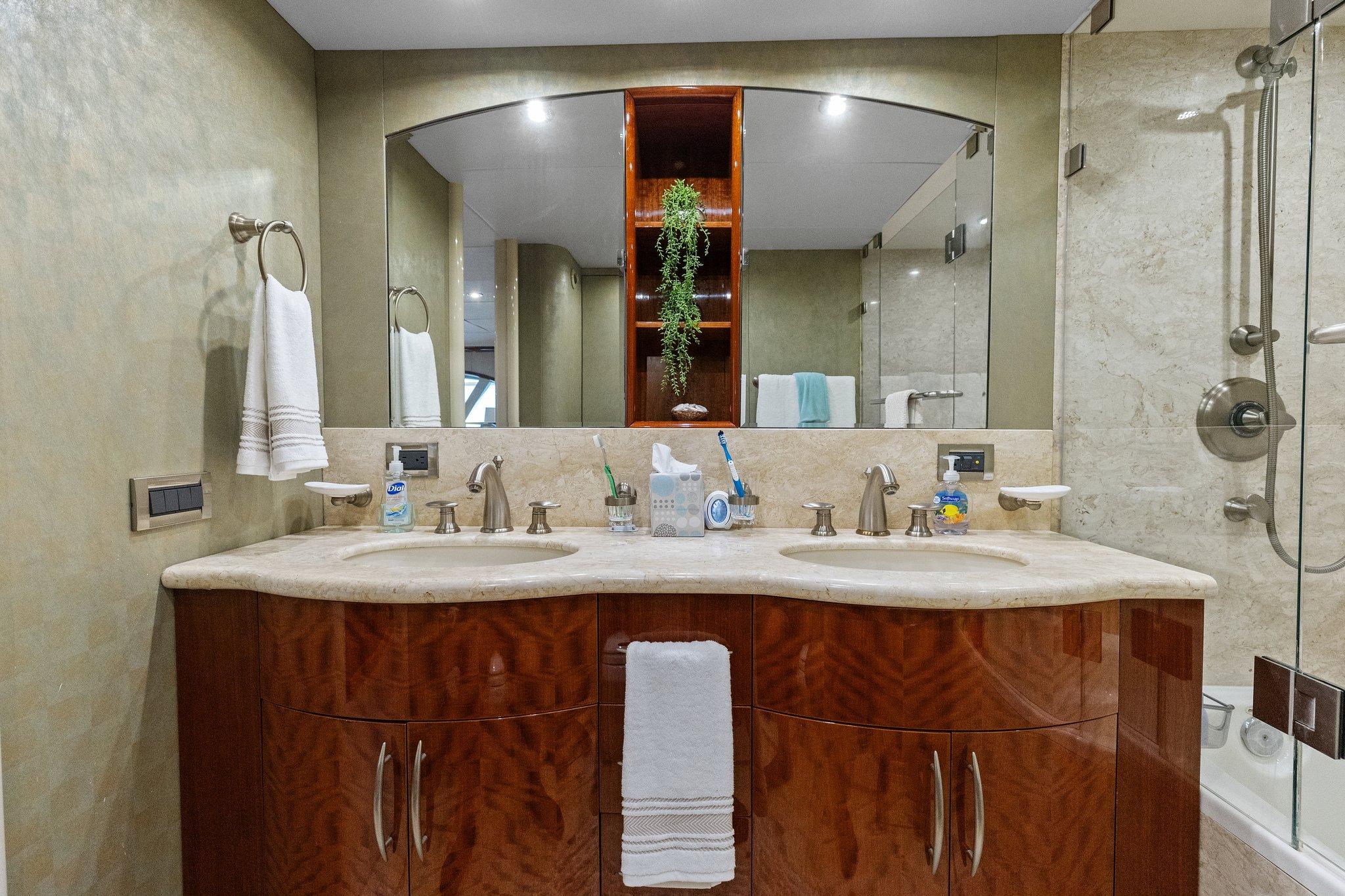 Lazzara-68 Pilothouse Motoryacht 2005 -FL-US-Luxurious bathroom in 2005 Lazzara 68 Pilothouse Motoryacht with double sinks and elegant fixtures.-9729104 | Thumbnail