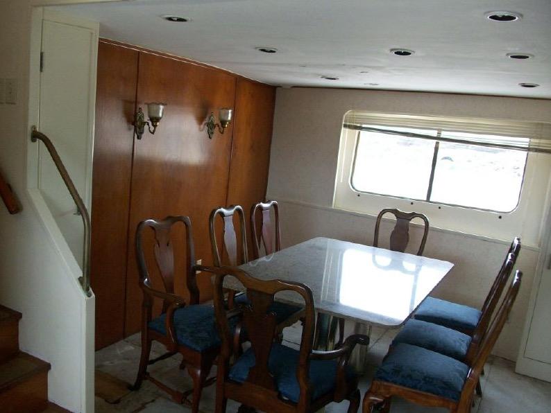 Dining area below deck (large hull windows)