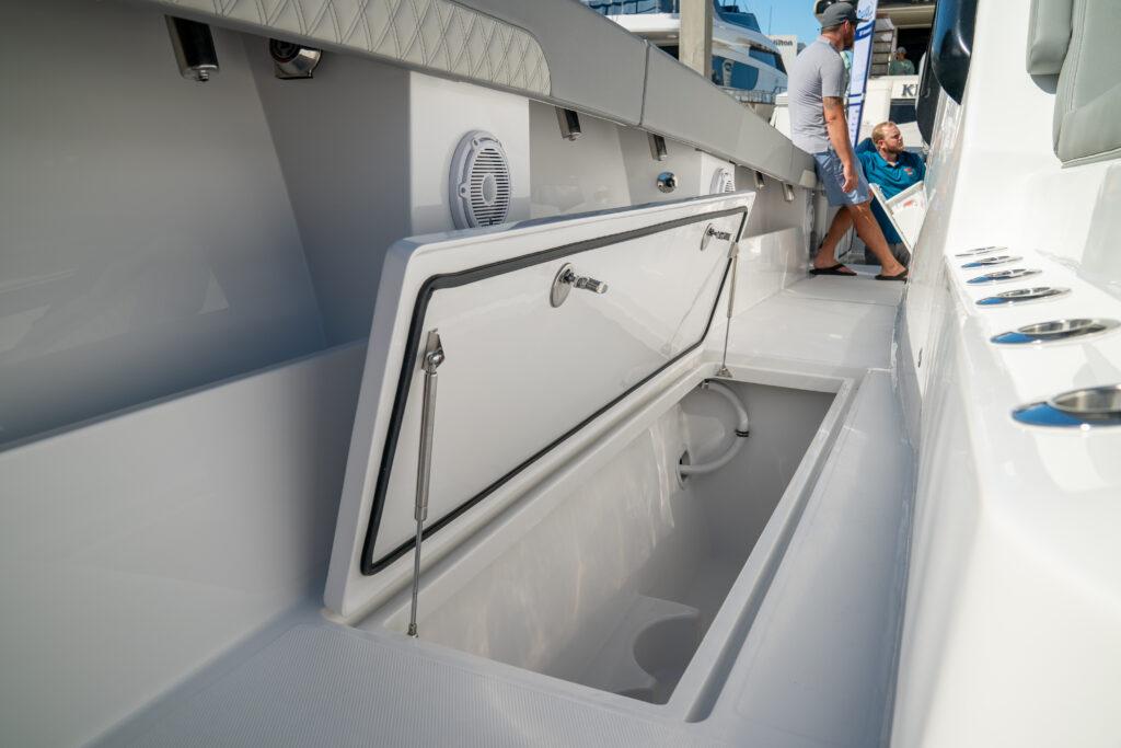 Front Runner-37 Catamaran 2026 -FL-US-2026 Front Runner 37 Catamaran deck with open storage compartment and seating area.-9829170 | Thumbnail