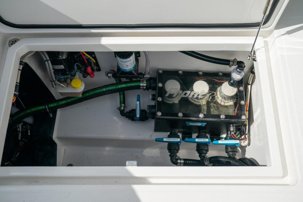Front Runner-37 Catamaran 2026 -FL-US-2026 Front Runner 37 Catamaran engine compartment with visible components and wiring.-9829170 | Thumbnail
