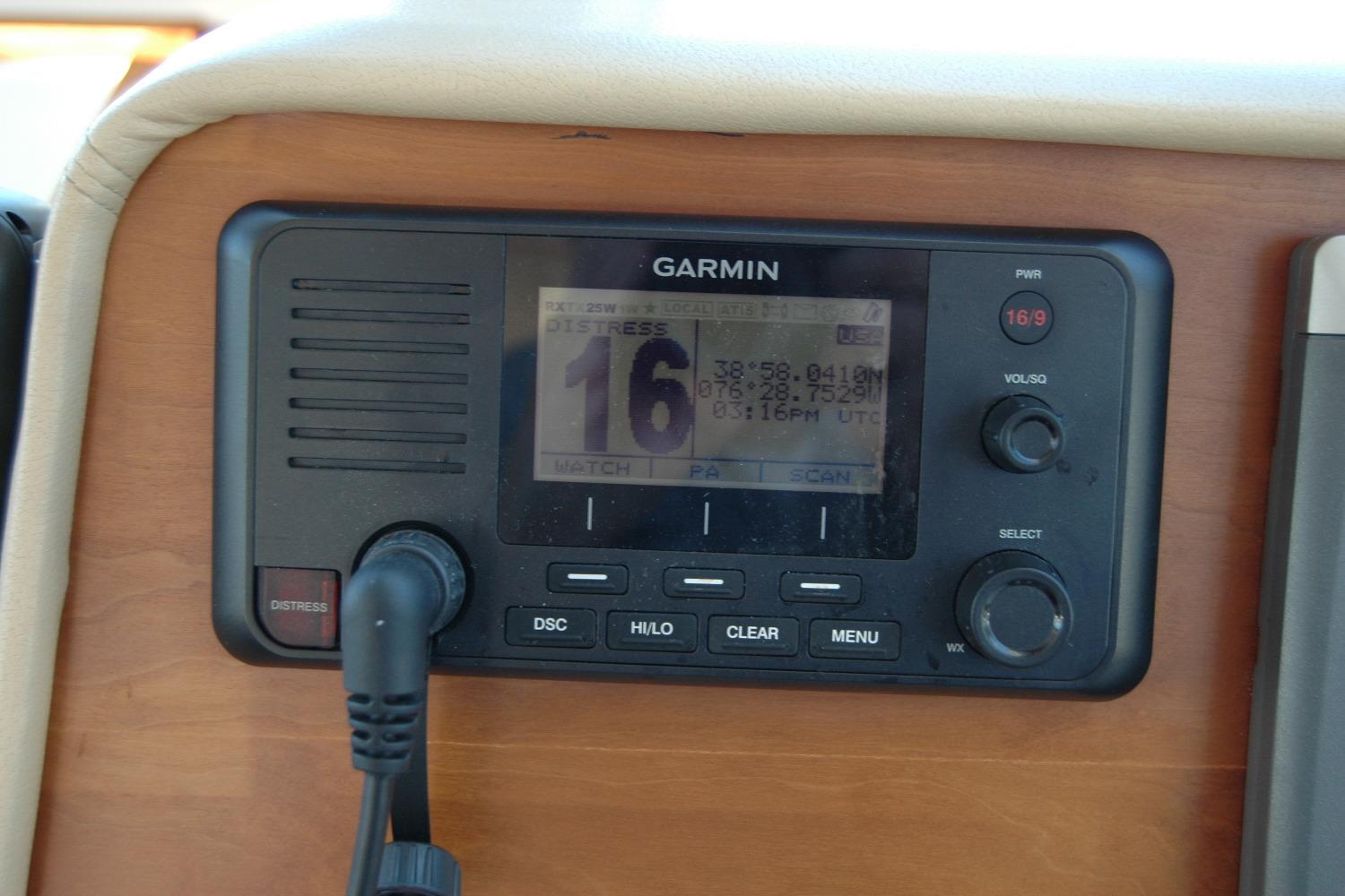 Garmin marine radio on 2014 Back Cove 37, displaying distress signal coordinates.