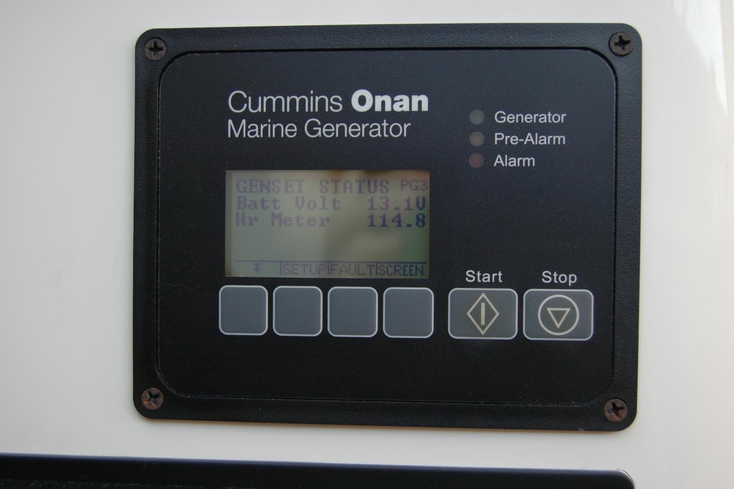 Cummins Onan marine generator display on 2014 Back Cove 37 boat, showing battery voltage and hour meter.