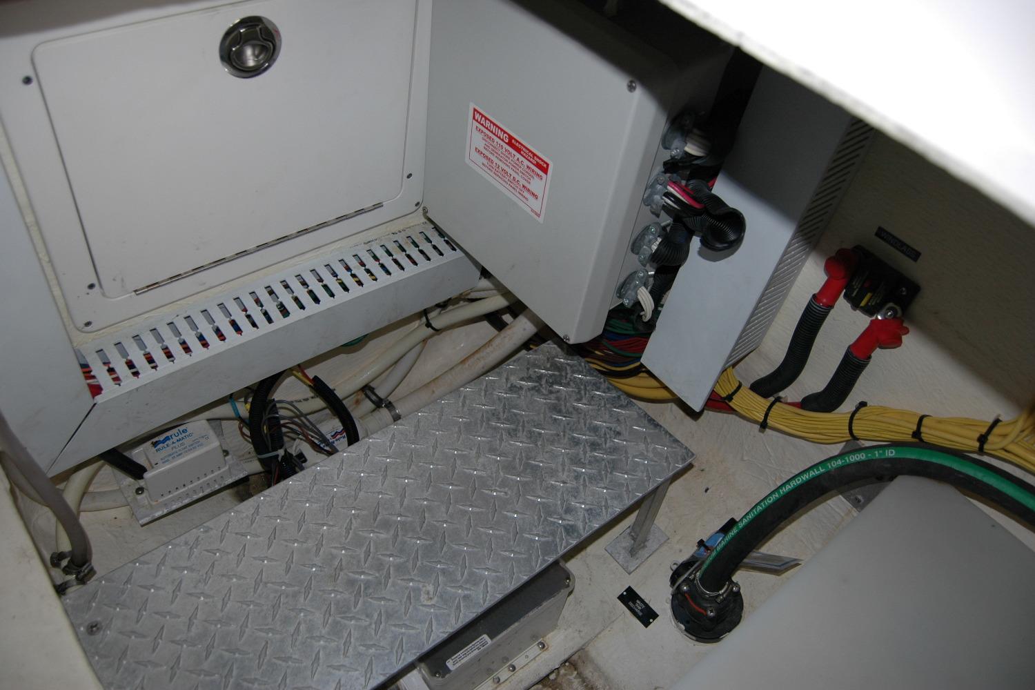 Engine room of 2014 Back Cove 37 boat with electrical components and wiring.