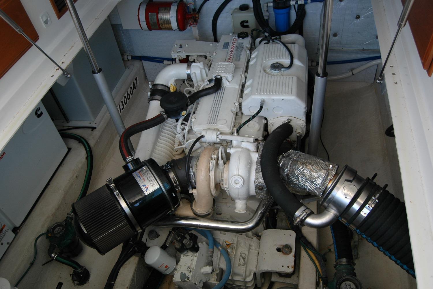 Engine compartment of a 2014 Back Cove 37 boat, featuring detailed mechanical components.