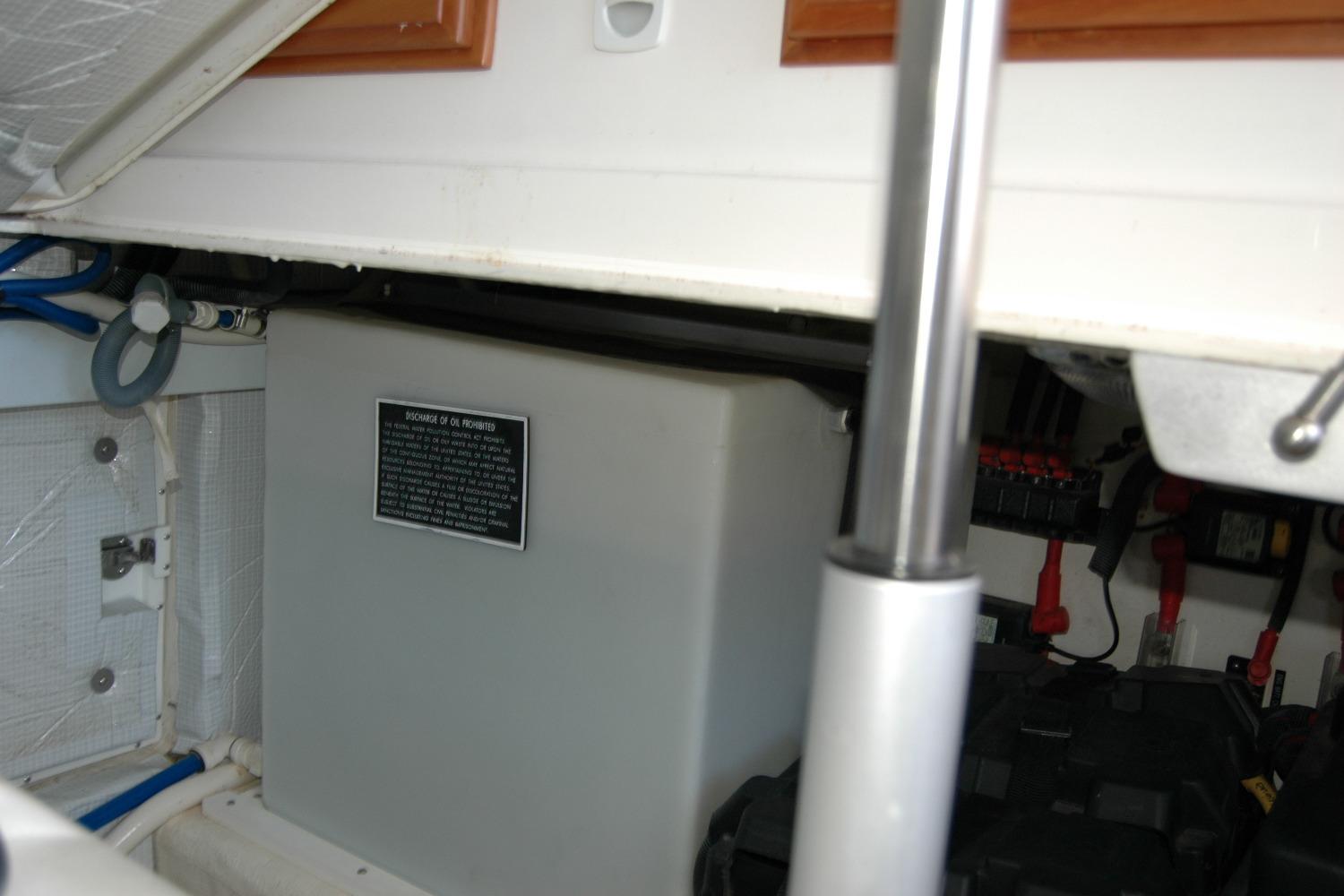 2014 Back Cove 37 engine compartment with hydraulic strut and wiring.