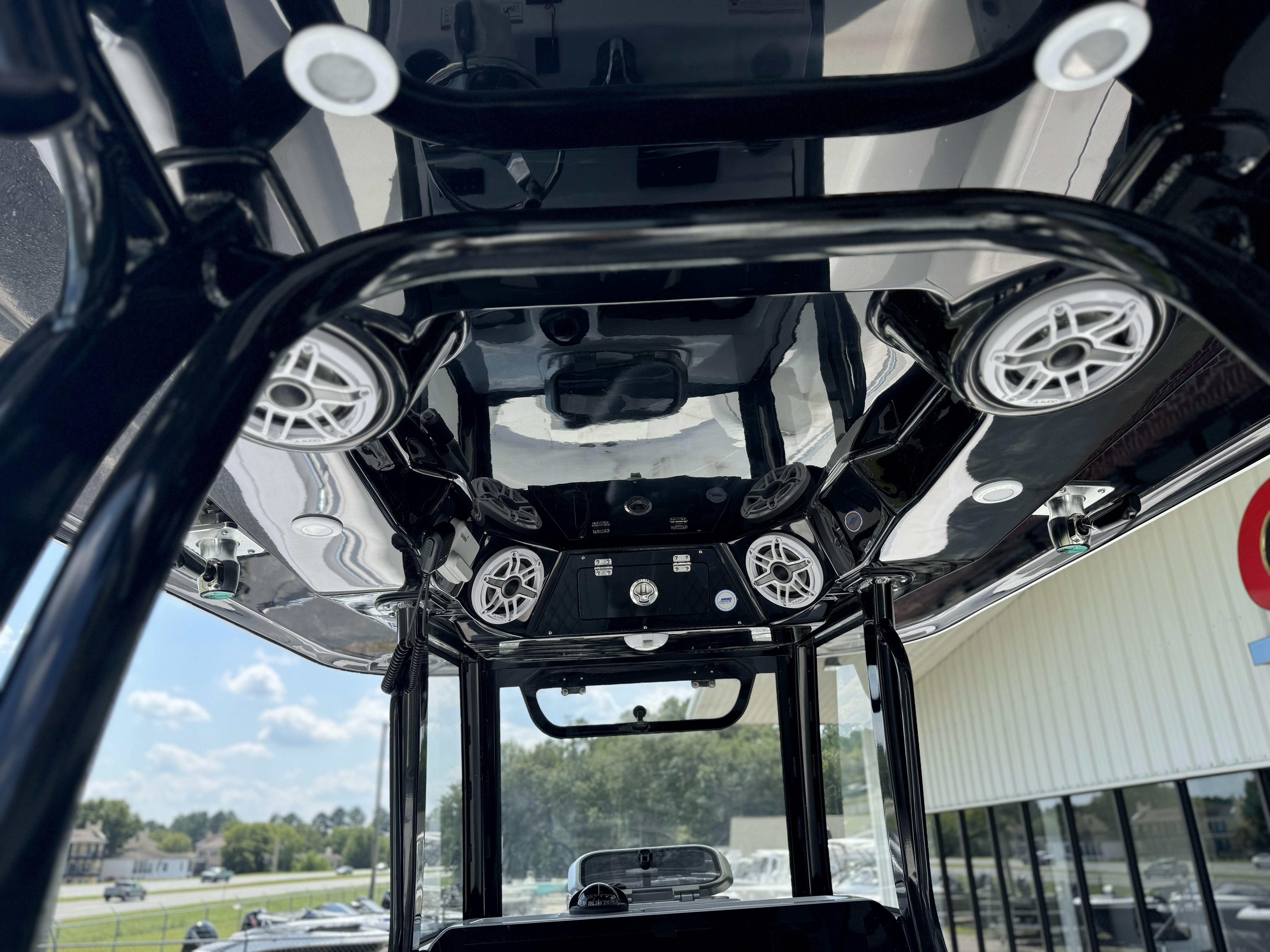2025 Sportsman Open 282 Center Console boat interior with speakers and sleek design.