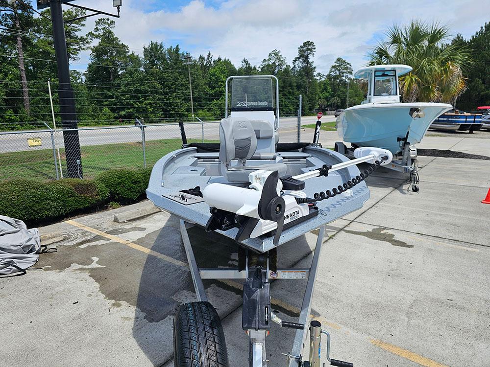 2023 Xpress H20B boat on trailer in outdoor setting.