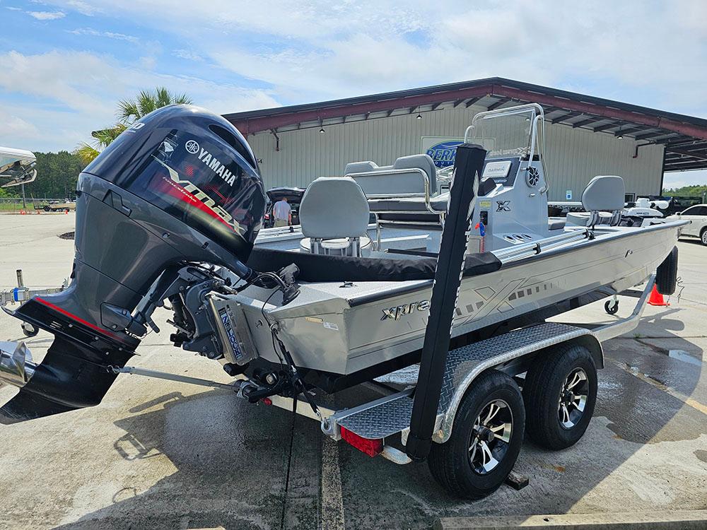 2023 Xpress H20B boat with Yamaha outboard motor on a trailer.