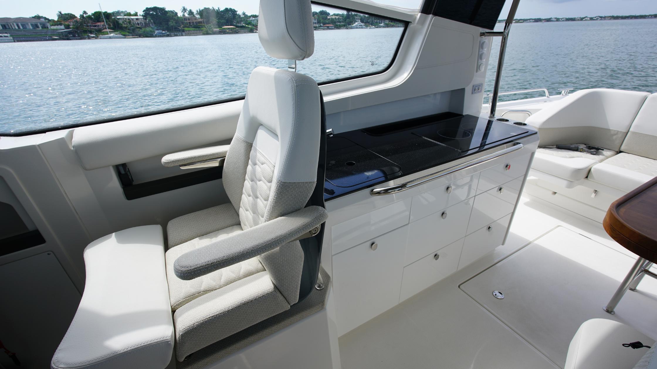 Nimbus-Weekender 11 #60 2025-In-Stock 2025 Nimbus W11 #60 FL-US-Luxurious interior of 2025 Nimbus Weekender 11 #60 yacht with modern seating and cabinetry.-9829239 | Thumbnail