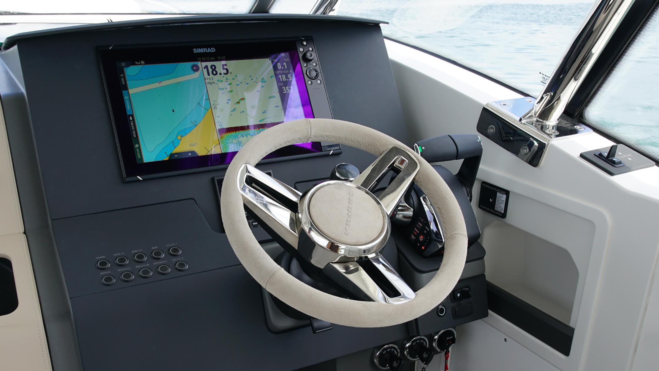 Nimbus-Weekender 11 #60 2025-In-Stock 2025 Nimbus W11 #60 FL-US-Helm of 2025 Nimbus Weekender 11 #60 with navigation display and steering wheel.-9829239 | Thumbnail
