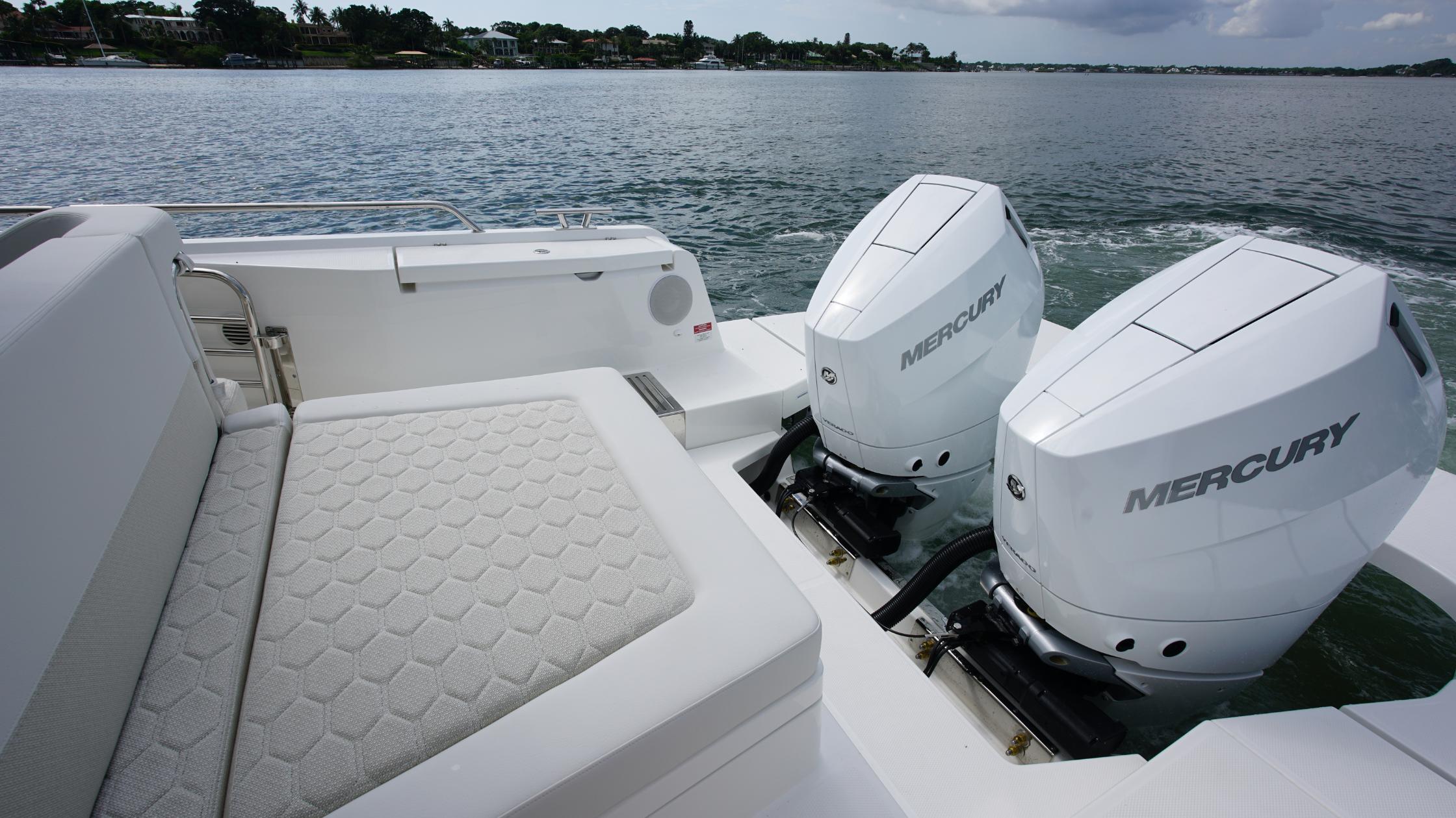 Nimbus-Weekender 11 #60 2025-In-Stock 2025 Nimbus W11 #60 FL-US-Luxury Nimbus Weekender 11 boat with dual Mercury engines on a serene lake, 2025 model.-9829239 | Thumbnail