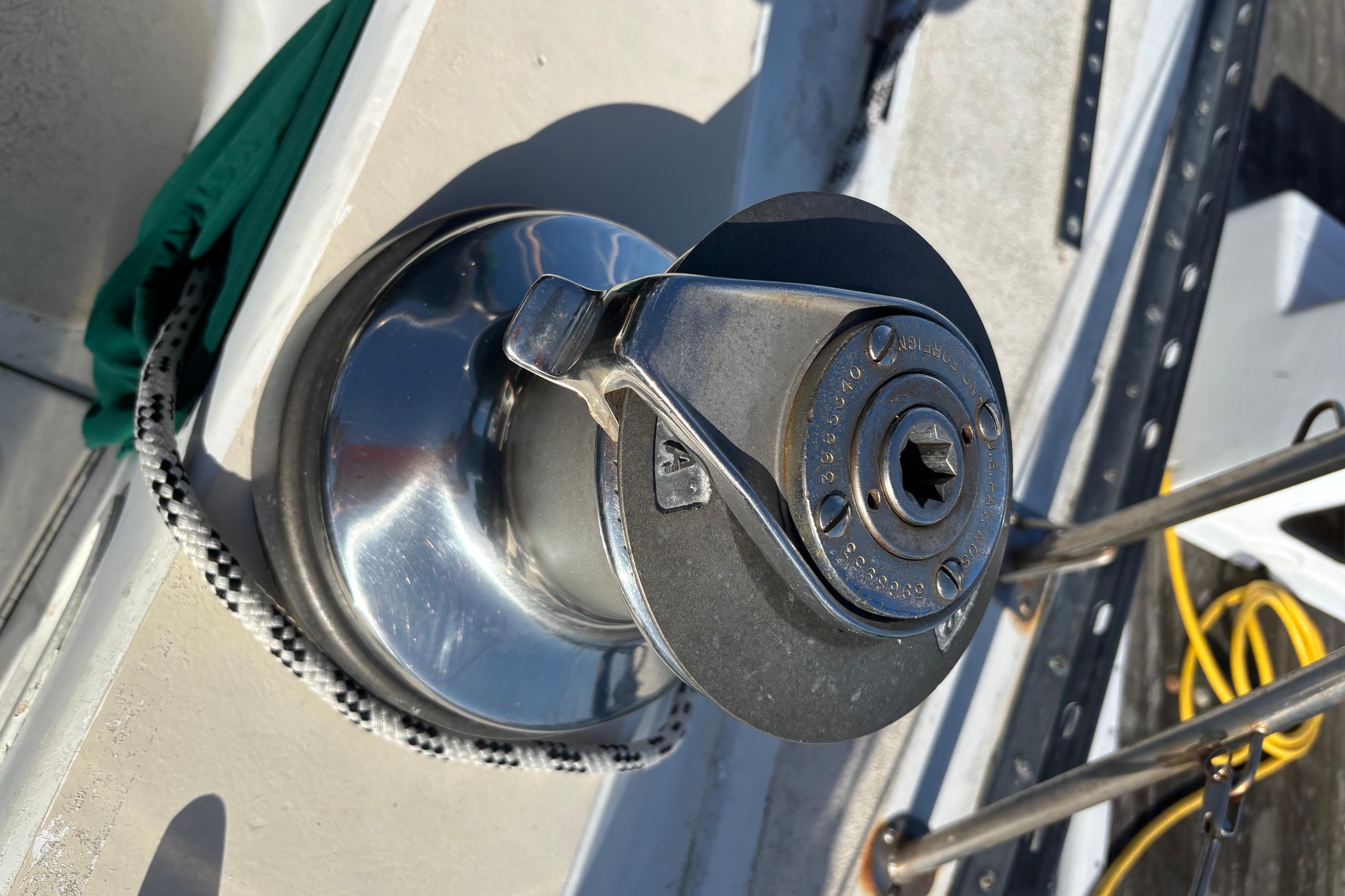 Close-up of a winch on a 1978 Islander 36 sailboat deck.