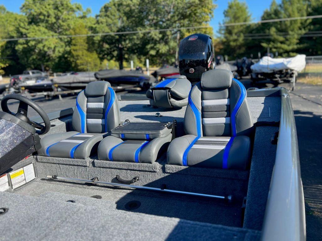 2023 Ranger RT198P boat interior with dual seats and steering wheel, outdoors.