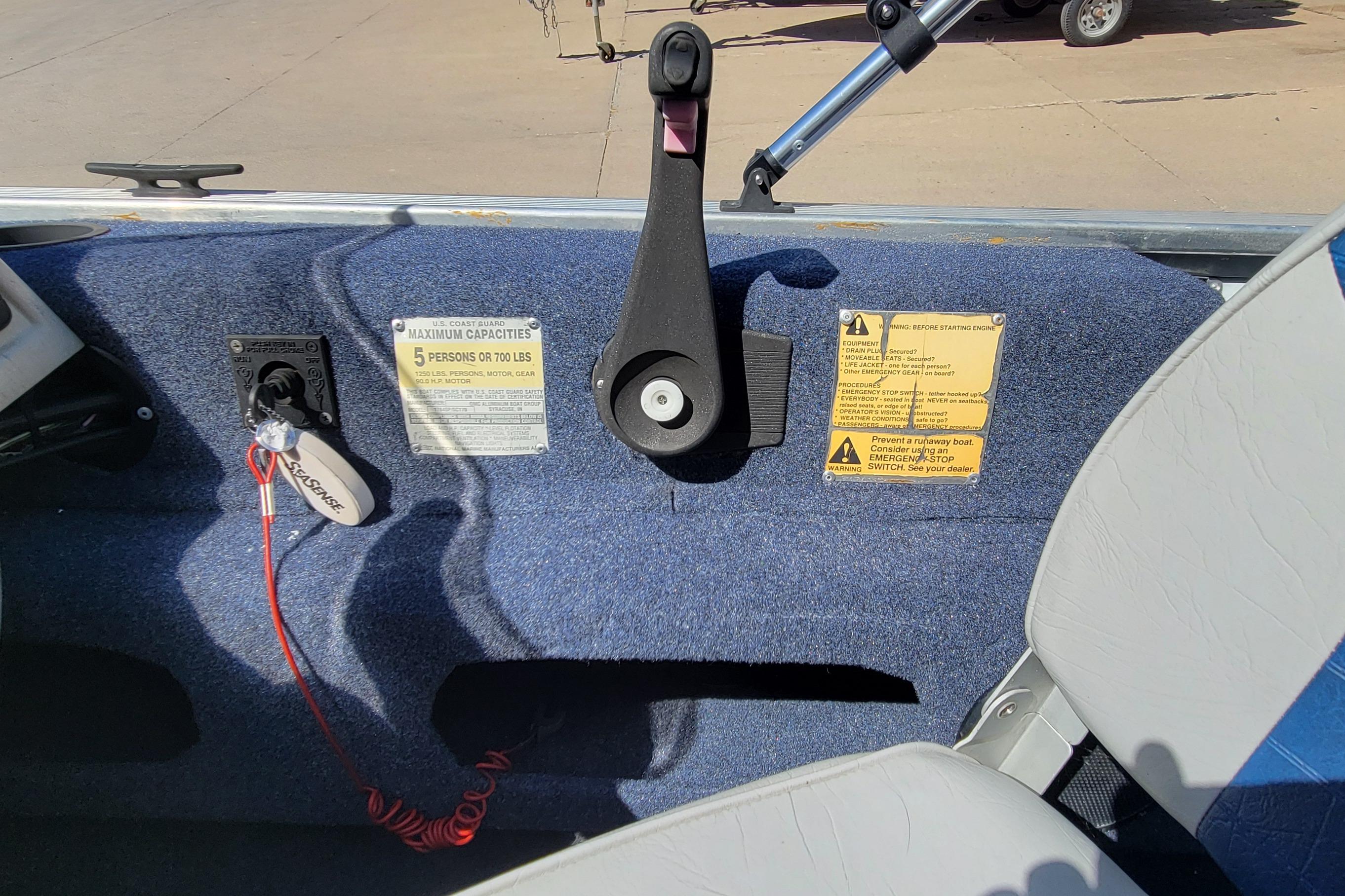 1997 Sea Nymph 168 DLX boat interior with control panel and safety instructions.